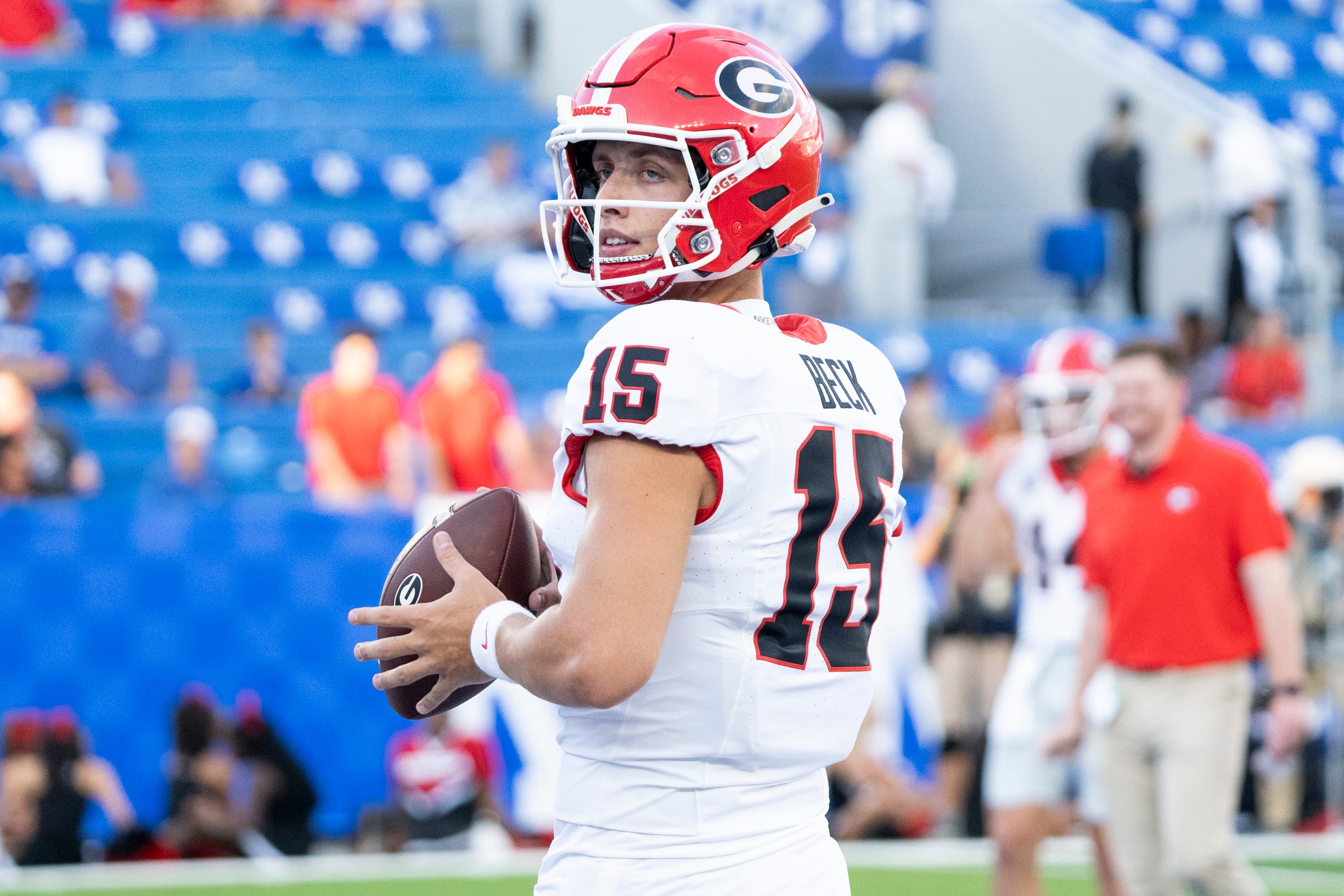 Georgia Bulldogs quarterback Carson Beck (15) warms up before the game against the Kentucky Wildcats at Kroger Field.