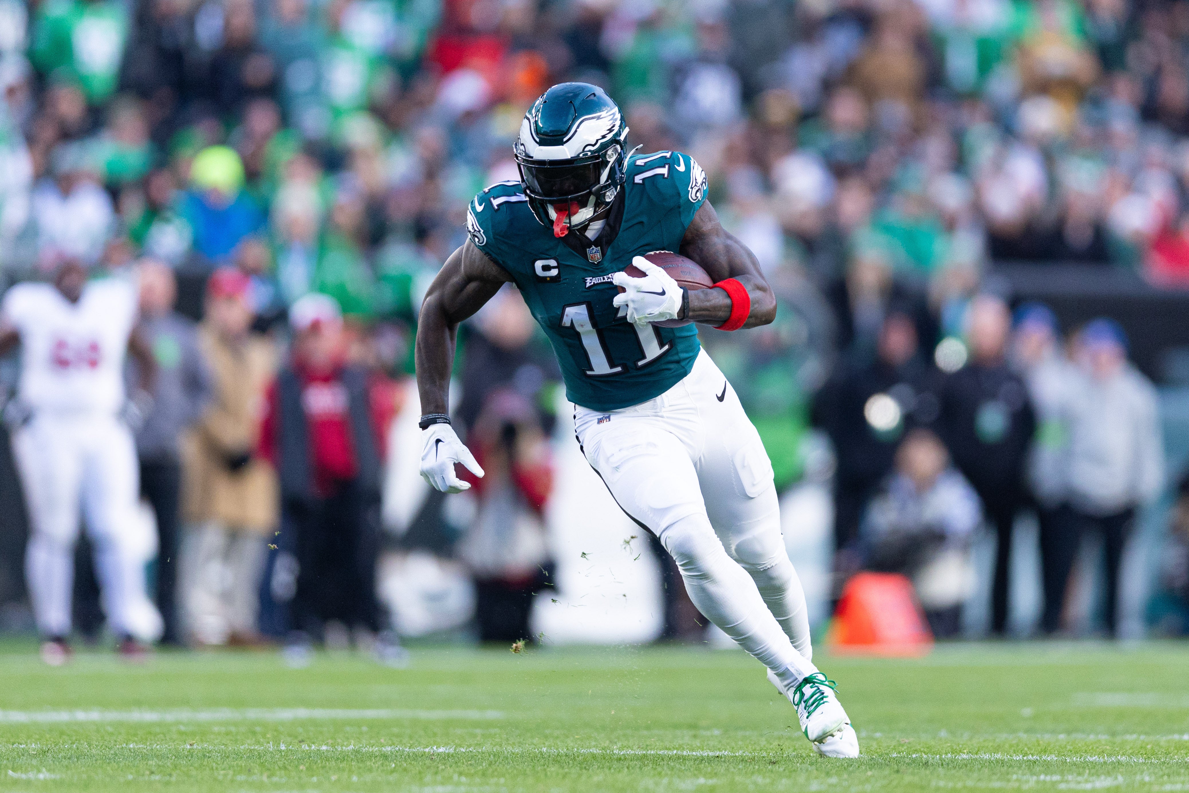 Philadelphia Eagles wide receiver A.J. Brown (11) runs with the ball during the fourth quarter against the Arizona Cardinals at Lincoln Financial Field.