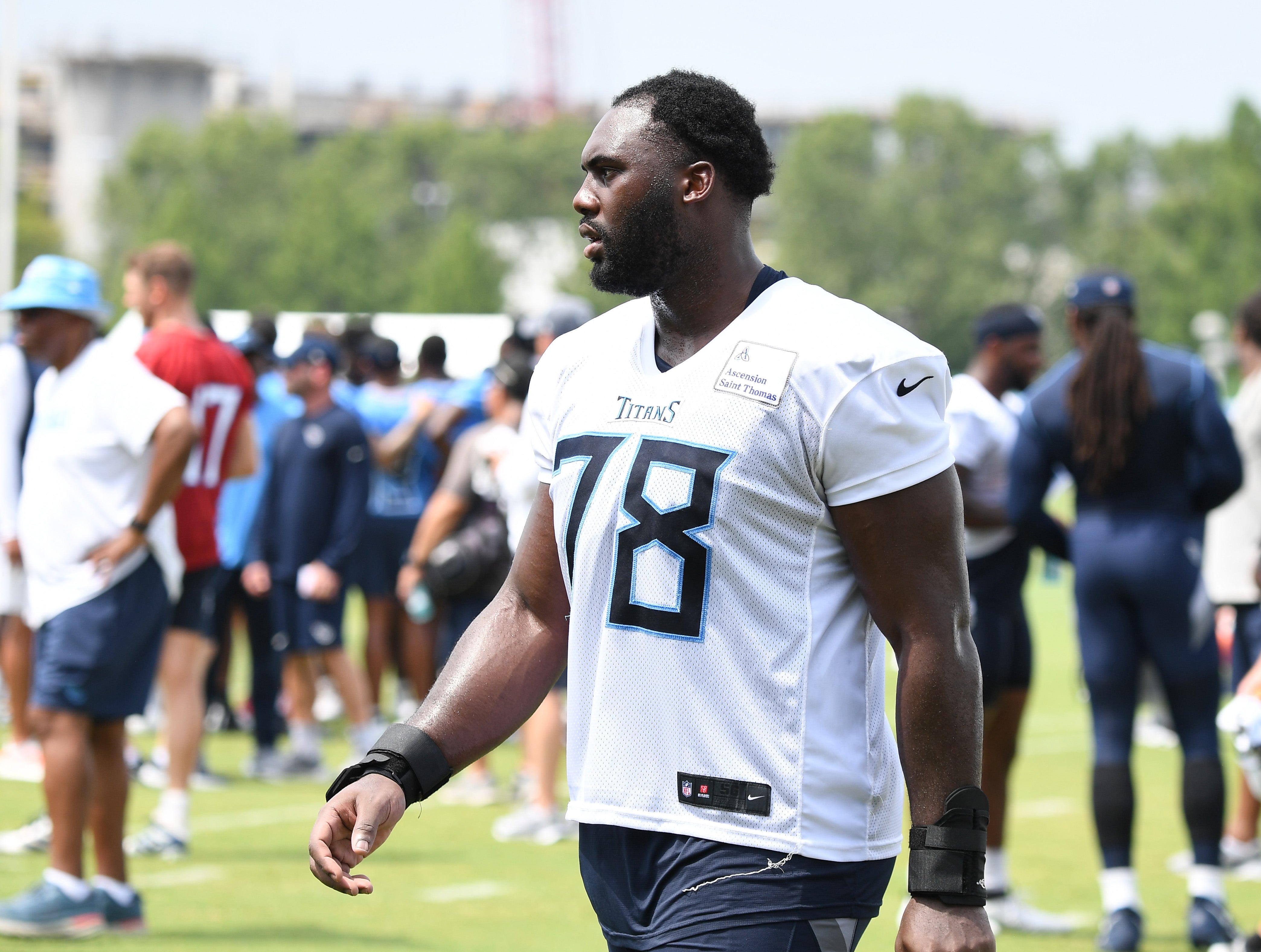 Jul 29, 2023; Nashville, TN, USA; Tennessee Titans offensive tackle Nicholas Petit-Frere (78) walks off the field after training camp. Mandatory Credit: Christopher Hanewinckel-Imagn Images