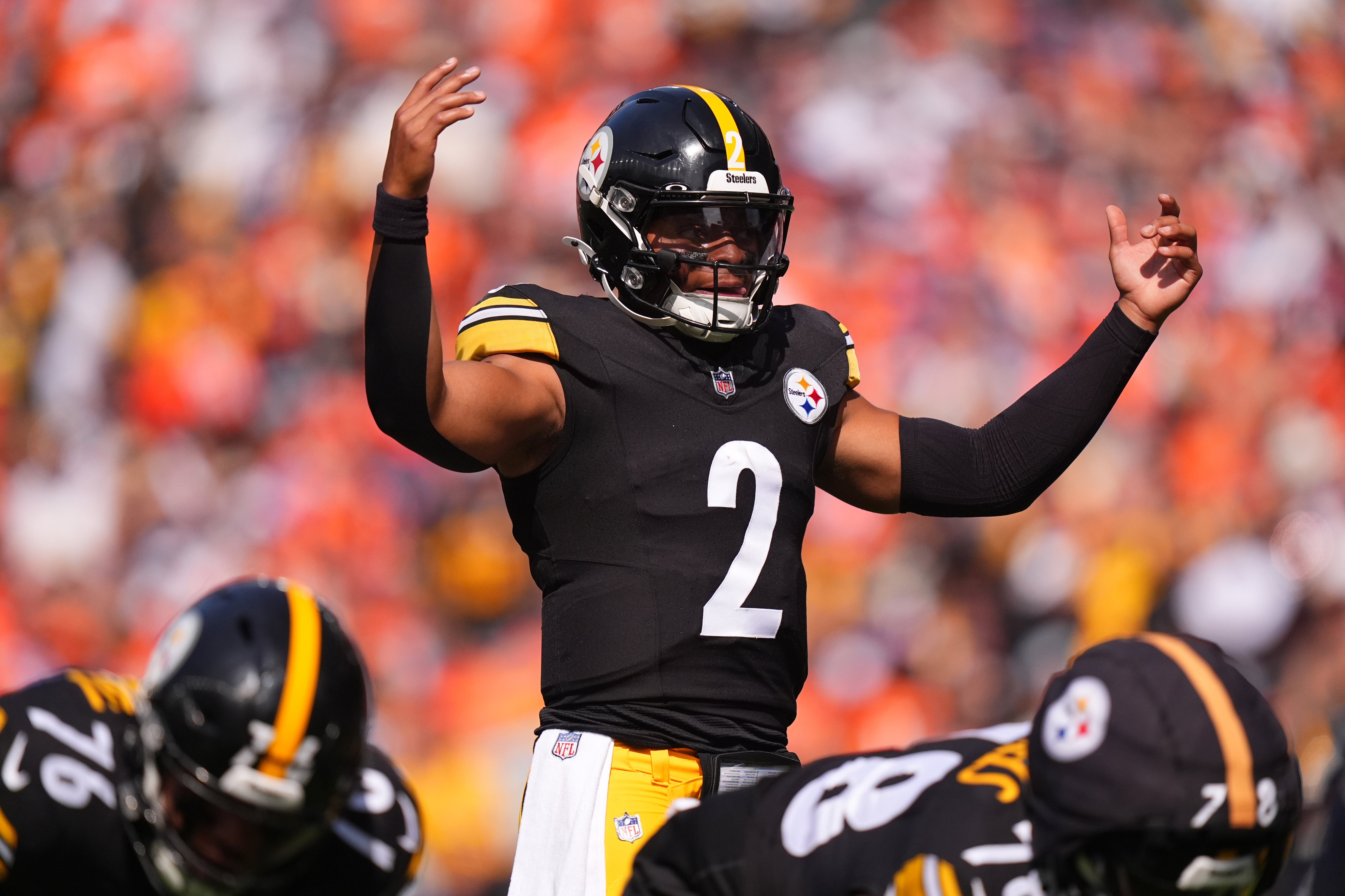 Sep 15, 2024; Denver, Colorado, USA; Pittsburgh Steelers quarterback Justin Fields (2) during the first quarter against the Denver Broncos at Empower Field at Mile High. Mandatory Credit: Ron Chenoy-Imagn Images