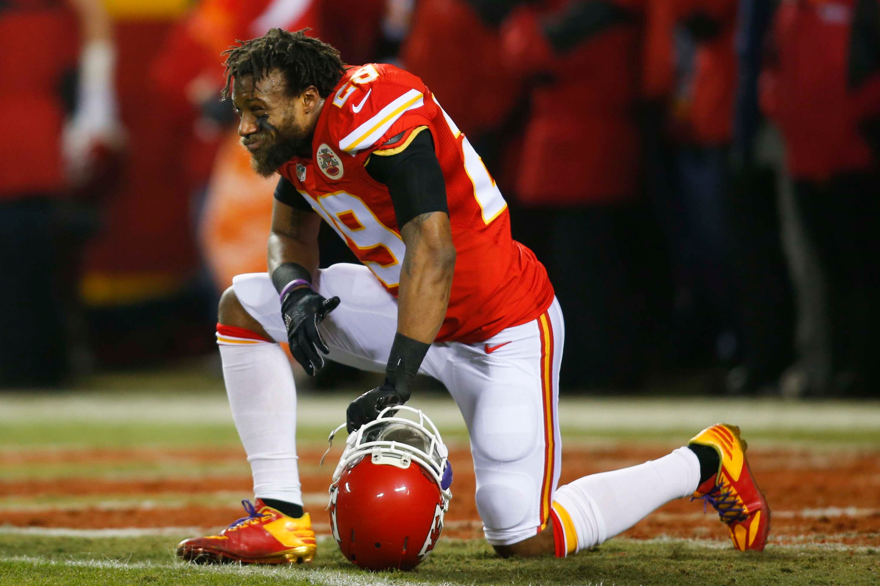 Jan 15, 2017; Kansas City, MO, USA; Kansas City Chiefs strong safety Eric Berry (29) kneels on the field before the game against the Pittsburgh Steelers in the AFC Divisional playoff game at Arrowhead Stadium.