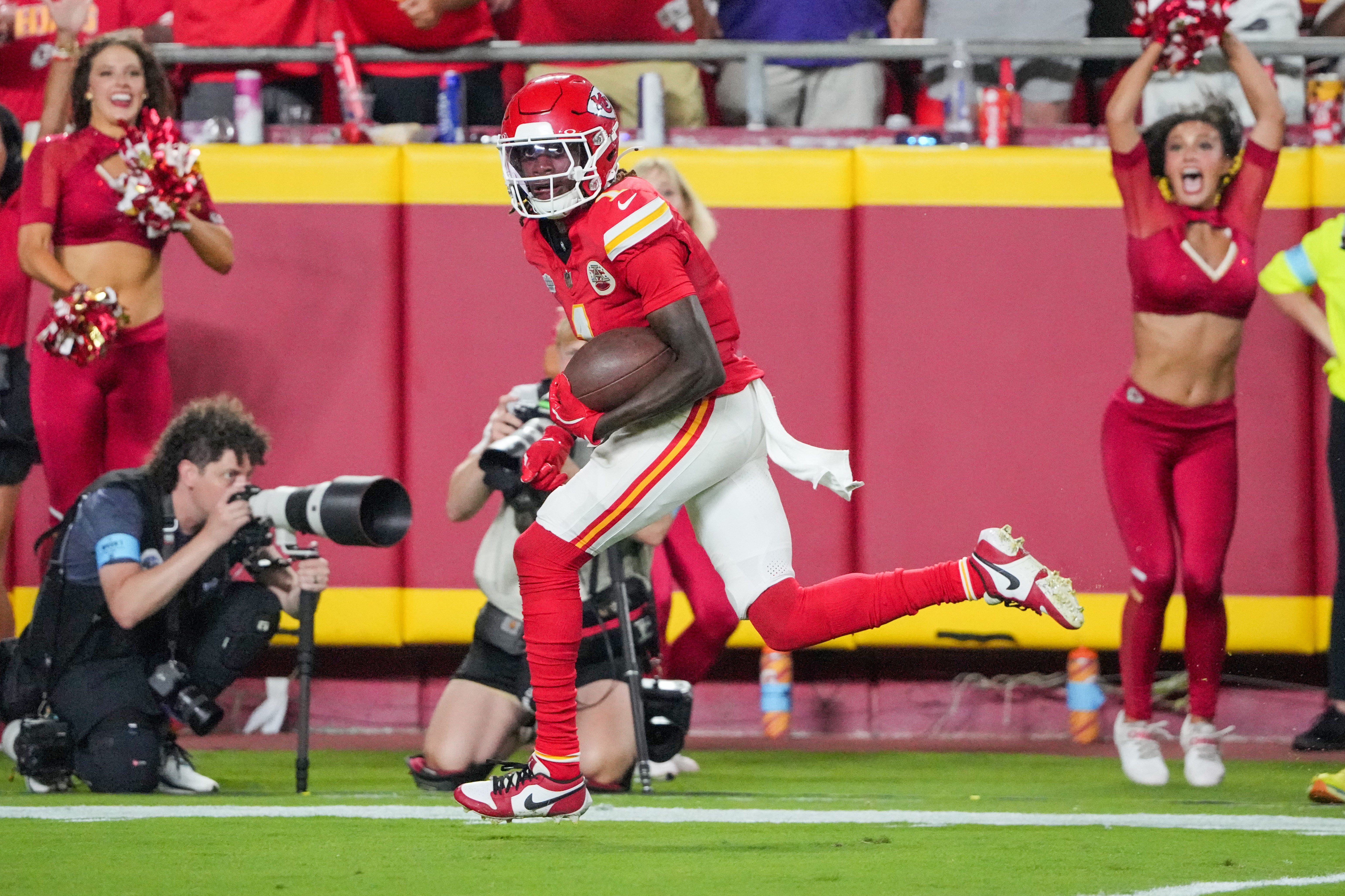 Sep 5, 2024; Kansas City, Missouri, USA; Kansas City Chiefs wide receiver Xavier Worthy (1) scores a touchdown against the Baltimore Ravens during the game at GEHA Field at Arrowhead Stadium.