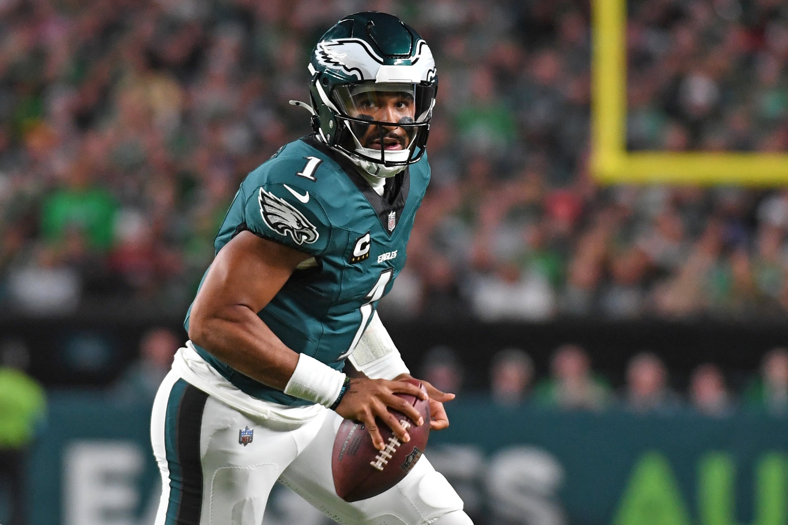 Philadelphia Eagles quarterback Jalen Hurts (1) runs with the football against the Atlanta Falcons at Lincoln Financial Field.