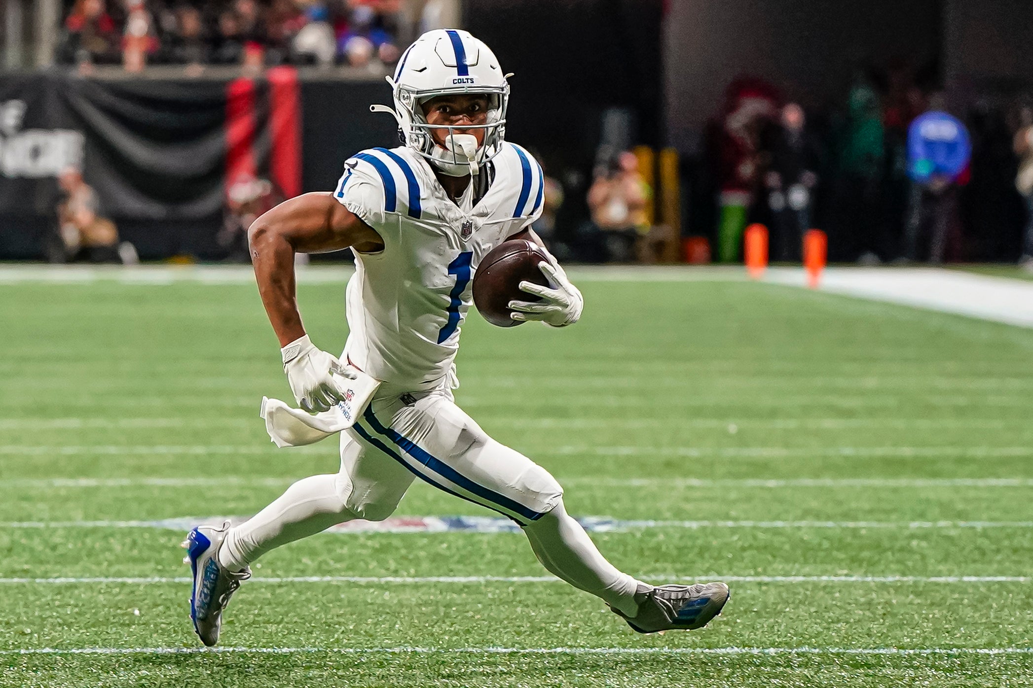 Dec 24, 2023; Atlanta, Georgia, USA; Indianapolis Colts wide receiver Josh Downs (1) runs after a catch against the Atlanta Falcons during the second half at Mercedes-Benz Stadium.