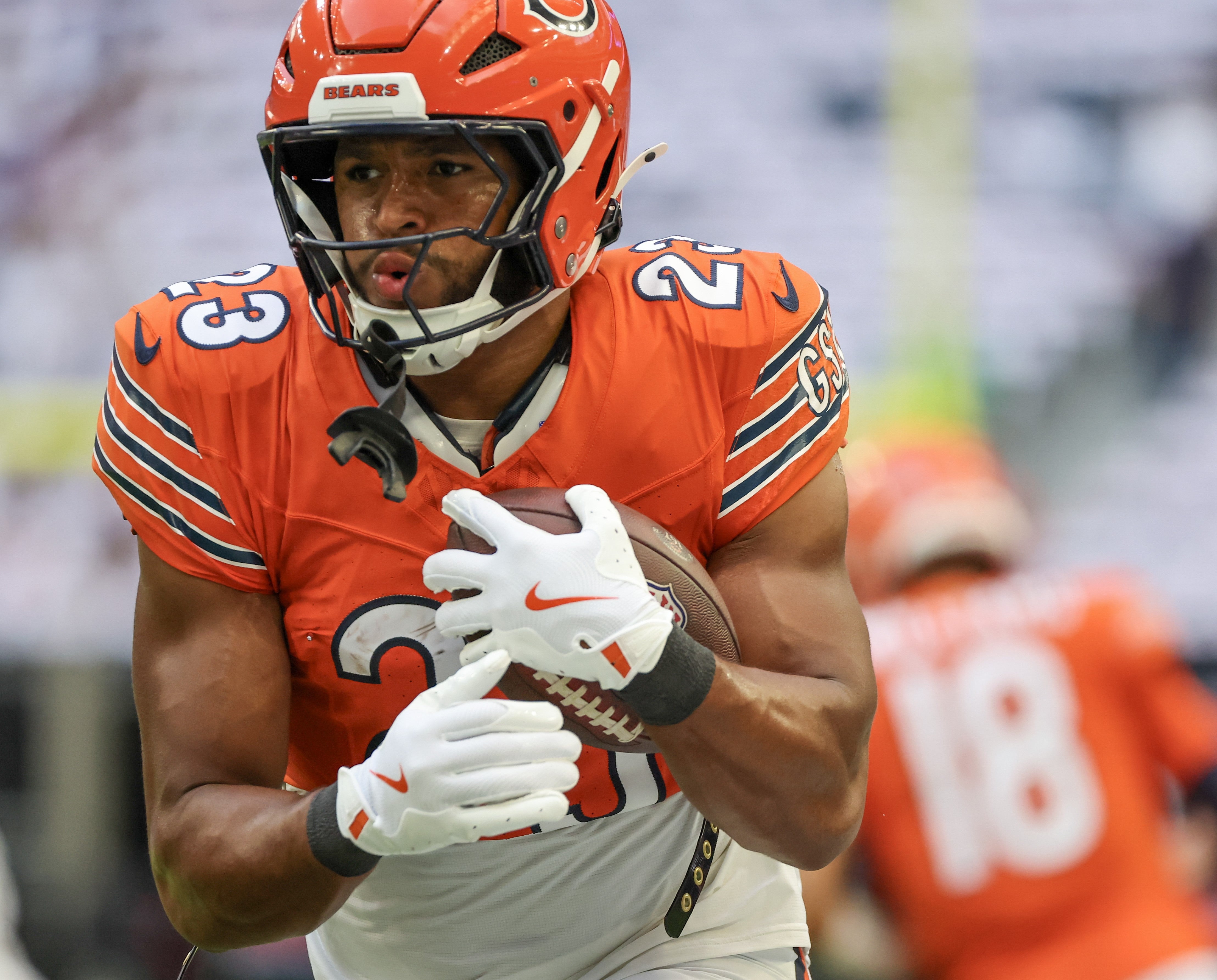 Sep 15, 2024; Houston, Texas, USA; Chicago Bears running back Roschon Johnson (23) carries the ball during warm ups before playing against the Houston Texans at NRG Stadium.