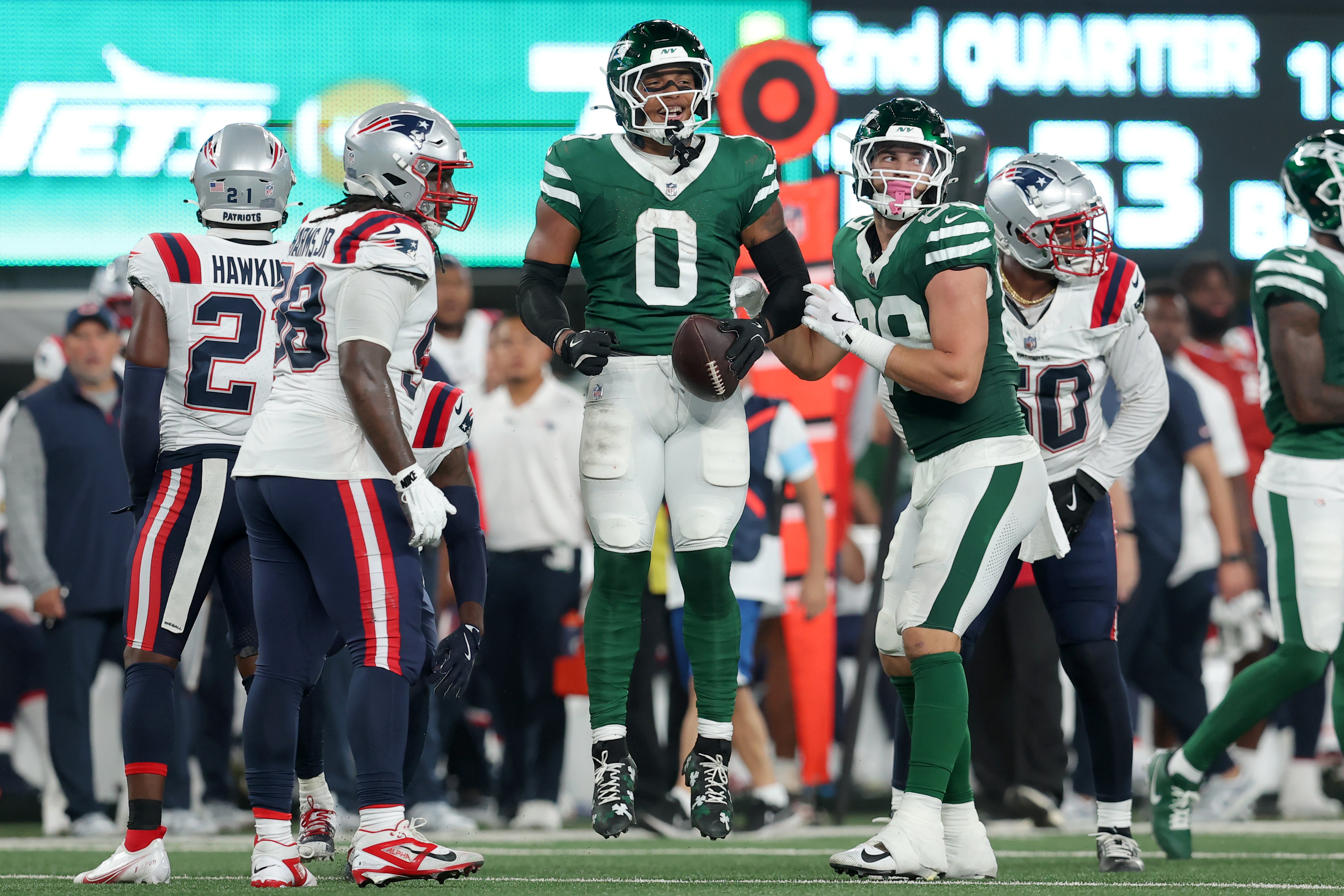 New York Jets running back Braelon Allen (0) reacts after a run against the New England Patriots during the second quarter at MetLife Stadium.