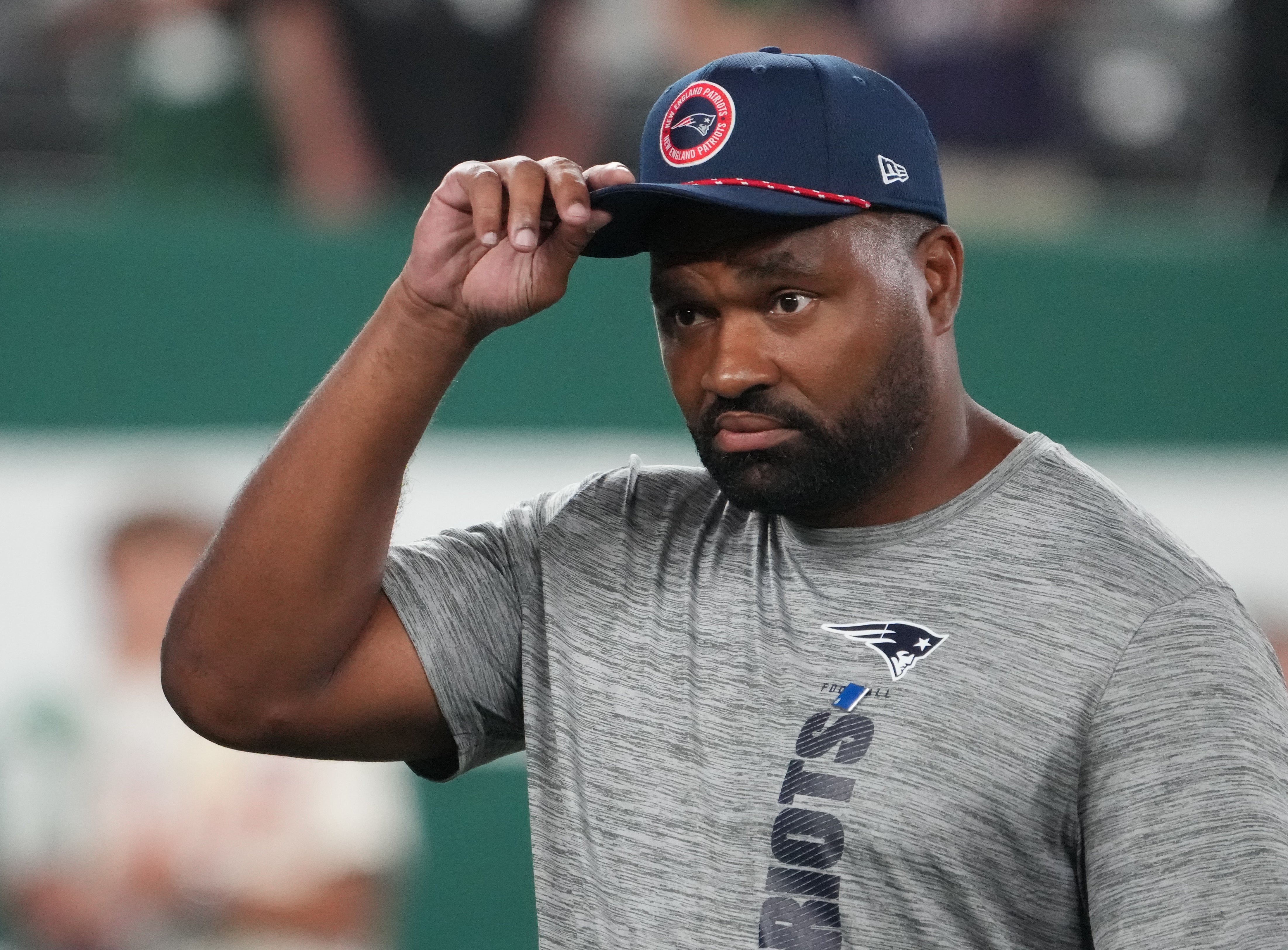 Sep 19, 2024; East Rutherford, New Jersey, USA; New England Patriots head coach Jerod Mayo pre game against the New York Jets at MetLife Stadium.