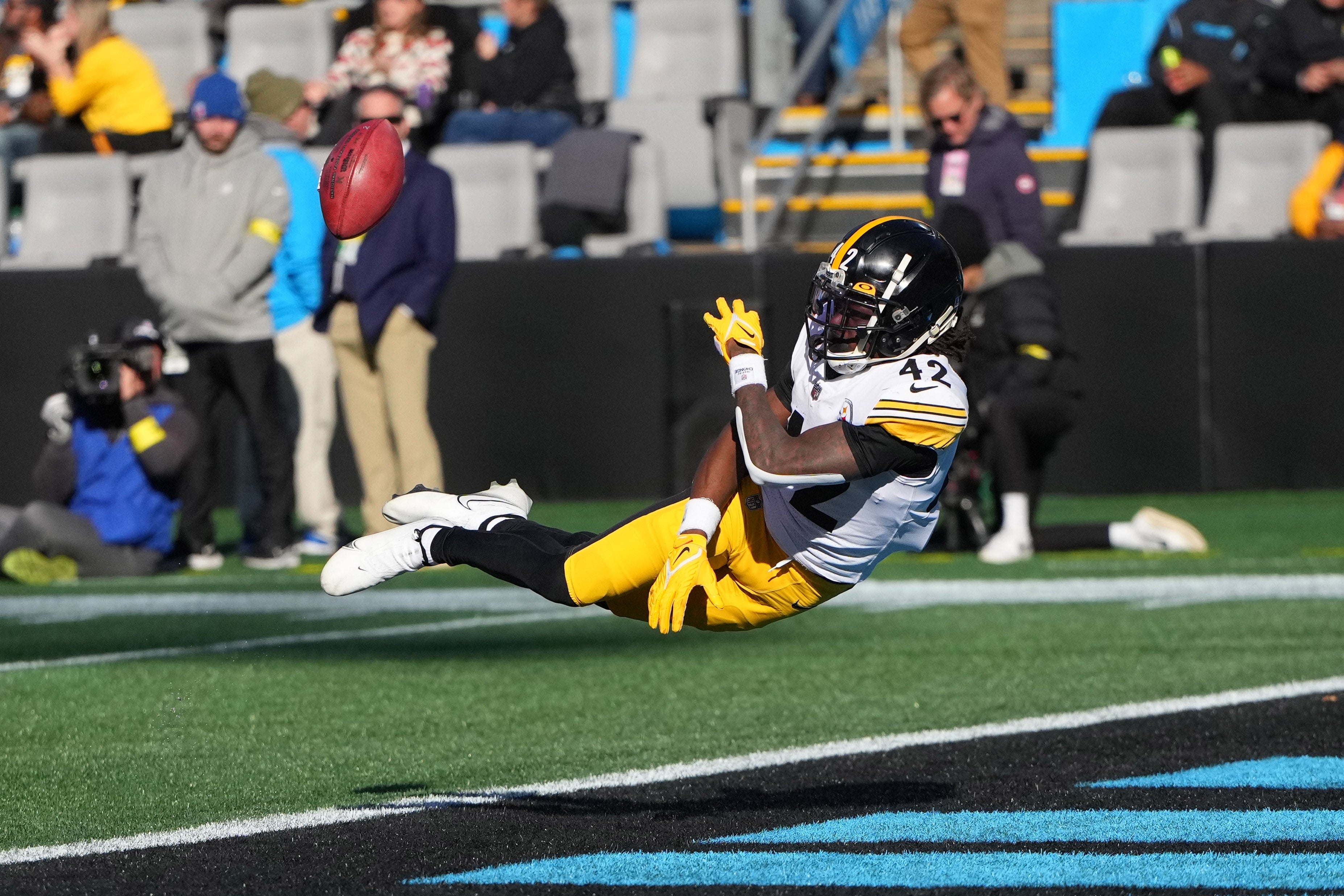 Dec 18, 2022; Charlotte, North Carolina, USA; Pittsburgh Steelers cornerback James Pierre (42) keeps a punt from going into the end zone giving Carolina Panthers poor field position to start a drive in the second quarter at Bank of America Stadium. Mandatory Credit: Bob Donnan-Imagn Images