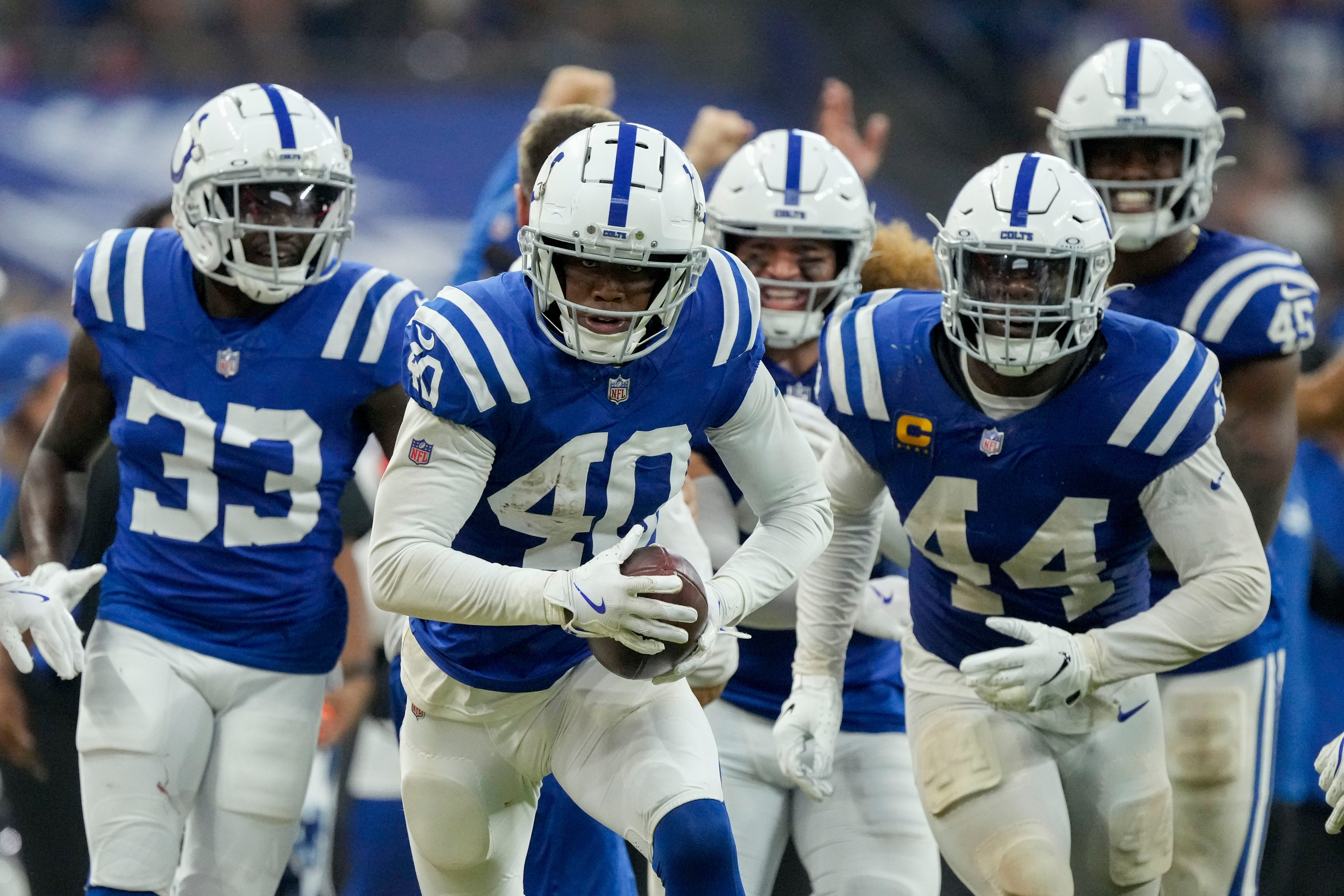 Indianapolis Colts cornerback Jaylon Jones (40) runs with the ball after making his second interception of the game Sunday, Sept. 22, 2024, during a game against the Chicago Bears at Lucas Oil Stadium in Indianapolis.