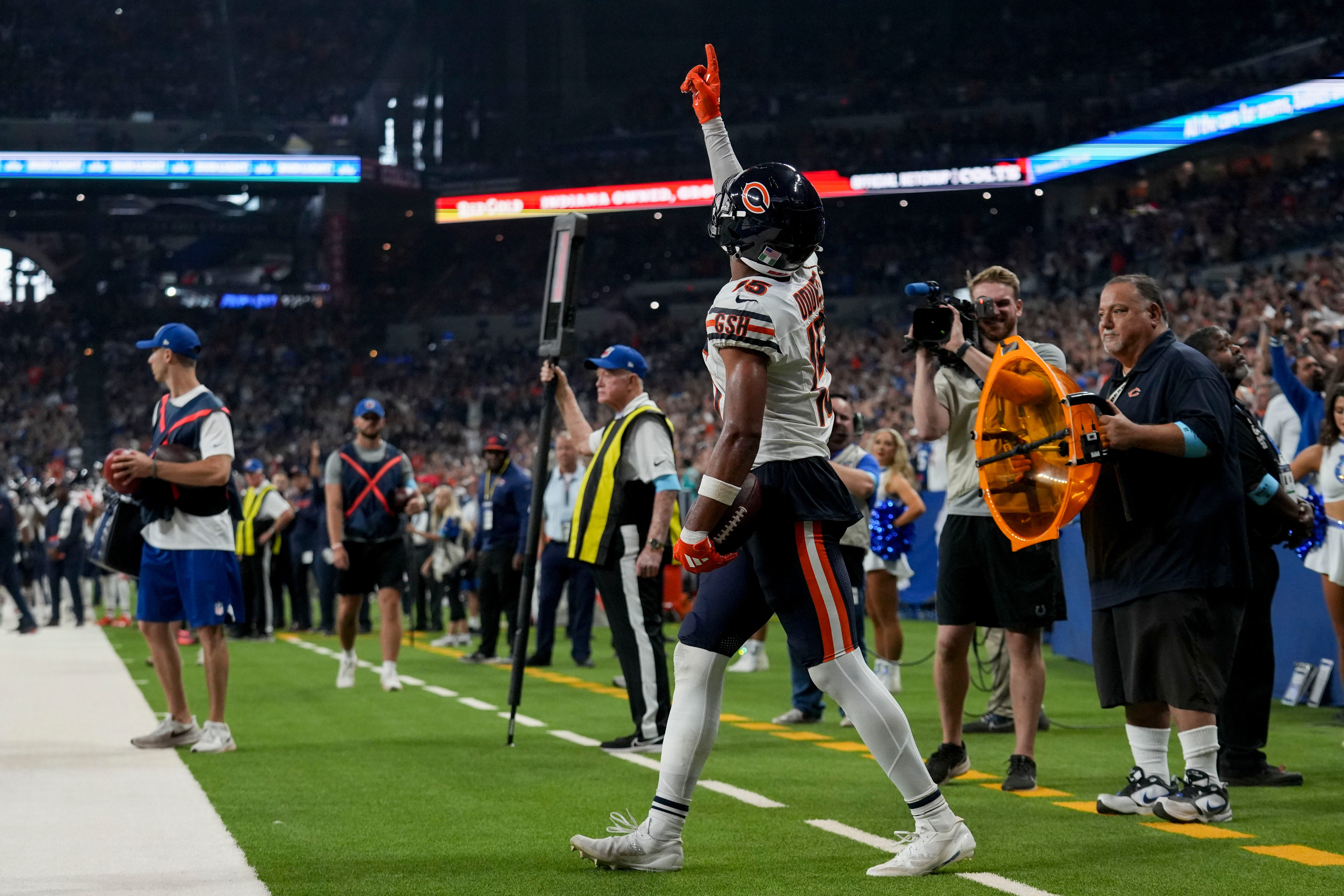Chicago Bears wide receiver Rome Odunze (15) celebrates a touchdown Sunday, Sept. 22, 2024, during a game against the Chicago Bears at Lucas Oil Stadium in Indianapolis.