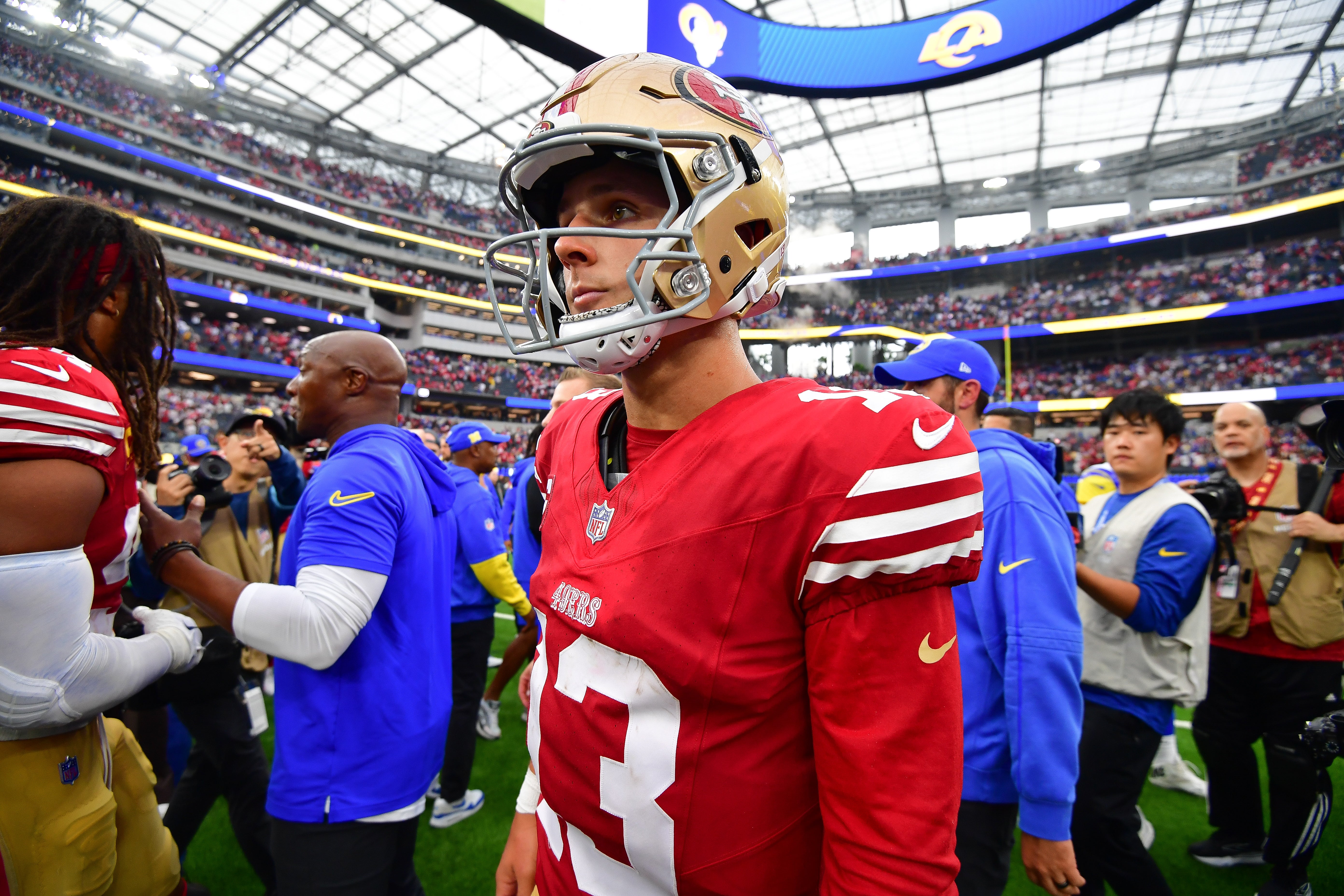 Sep 22, 2024; Inglewood, California, USA; San Francisco 49ers quarterback Brock Purdy (13) reacts following the loss against the Los Angeles Rams at SoFi Stadium.