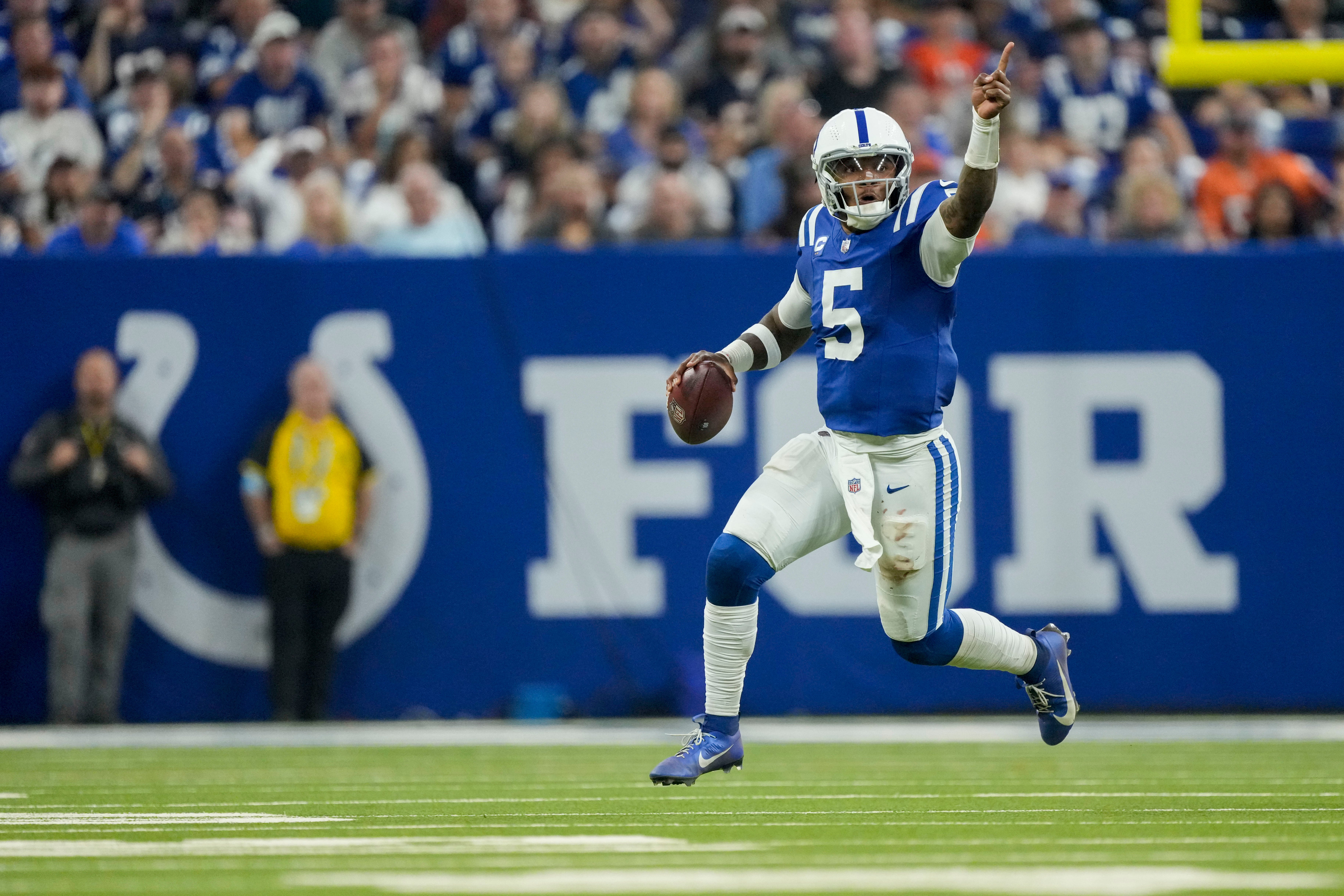 Sep 22, 2024; Indianapolis, Indiana, USA; Indianapolis Colts quarterback Anthony Richardson (5) looks for a receiver during a game against the Chicago Bears at Lucas Oil Stadium.