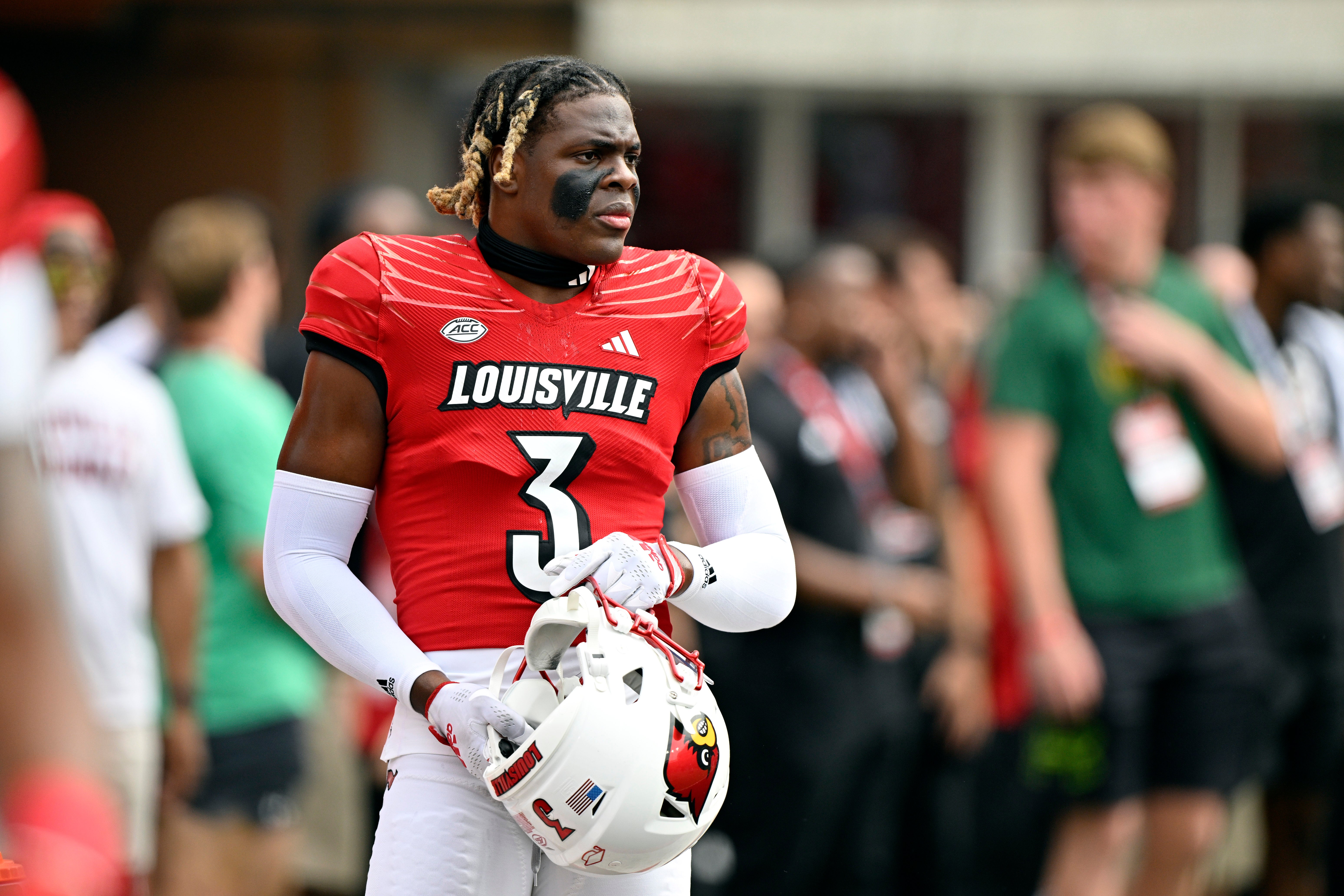Louisville Cardinals defensive back Quincy Riley (3) watches during warmups before facing off against the Austin Peay Governors at L&N Federal Credit Union Stadium.