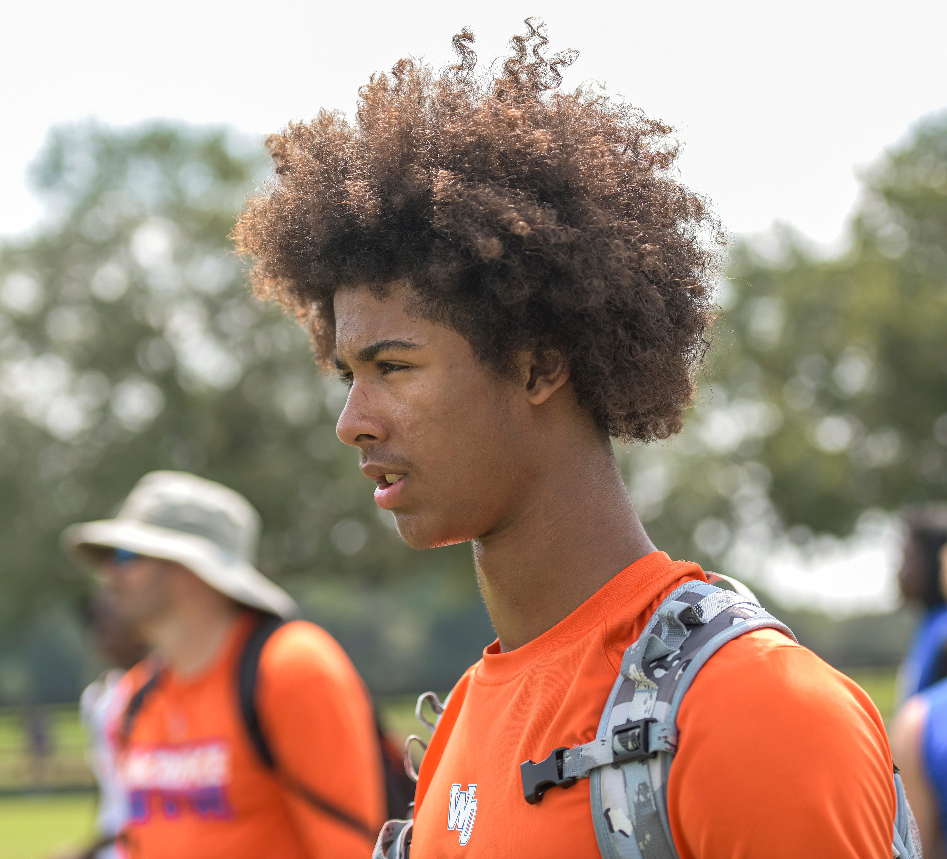 West Orange High School Warriors Ivan Taylor watches from the sidelines at the Florida High School 7v7 Association state championship in The Villages.