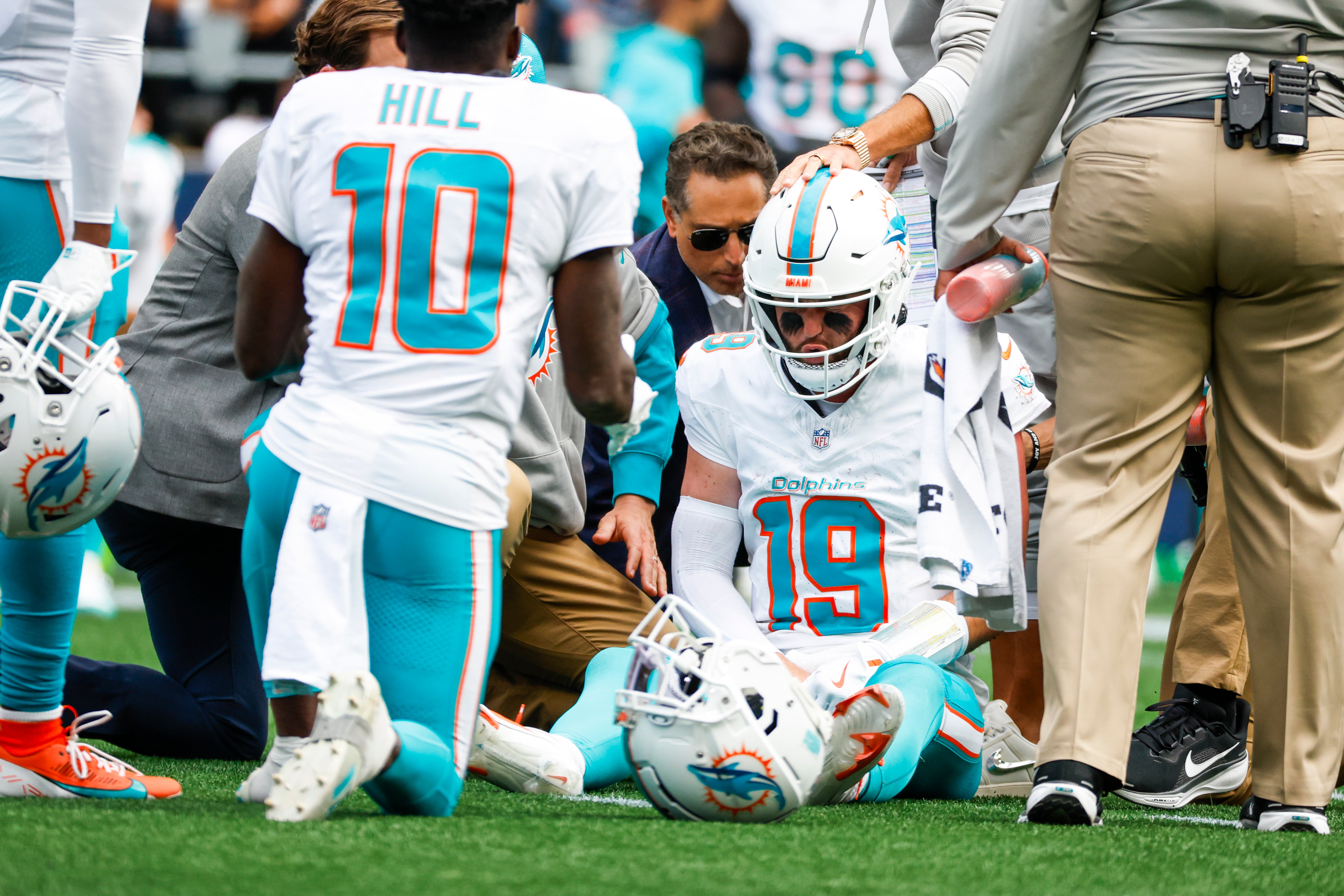 Sep 22, 2024; Seattle, Washington, USA; Miami Dolphins quarterback Skylar Thompson (19) receives medical attention after suffering an injury during the third quarter against the Seattle Seahawks at Lumen Field. Mandatory Credit: Joe Nicholson-Imagn Images