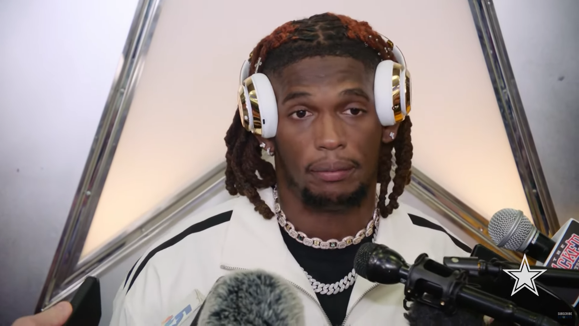 Dallas Cowboys WR CeeDee Lamb talks to reporters.