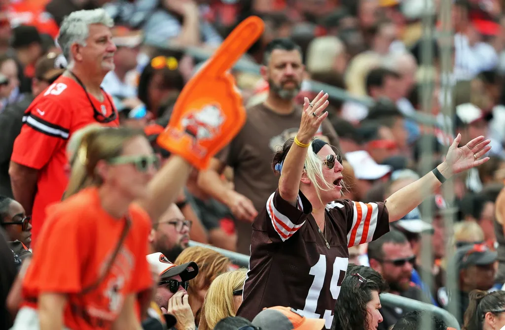 Cleveland Browns fans react as the New York Giants offense takes the field during the second half of an NFL football game at Huntington Bank Field, Sunday, Sept. 22, 2024, in Cleveland, Ohio
