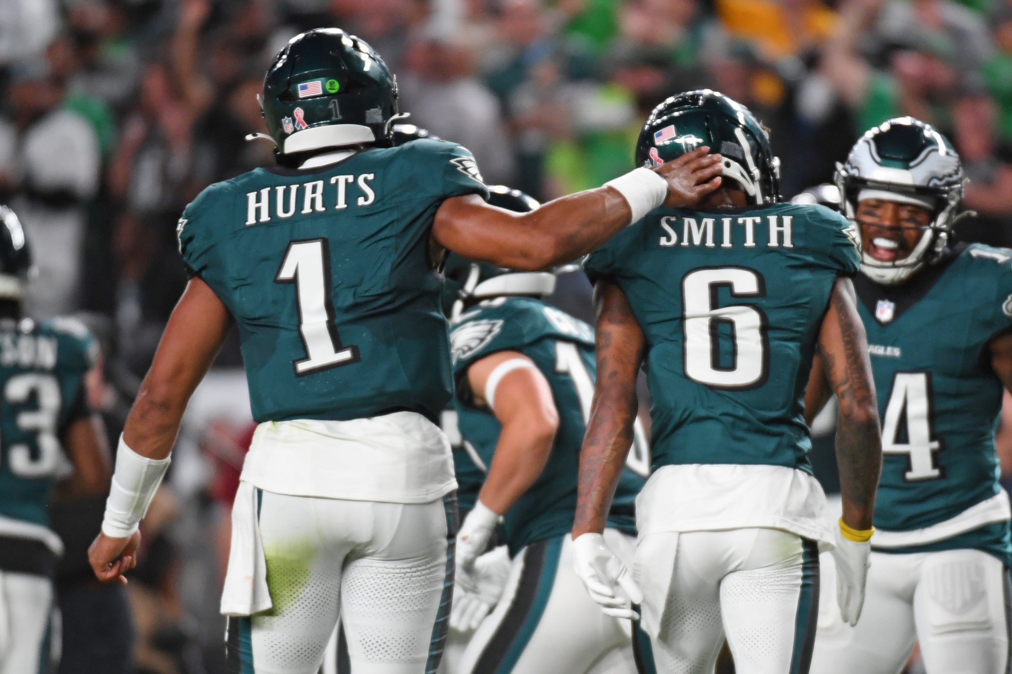Philadelphia Eagles quarterback Jalen Hurts (1) and wide receiver DeVonta Smith (6) celebrate touchdown during the second quarter against the Atlanta Falcons at Lincoln Financial Field.