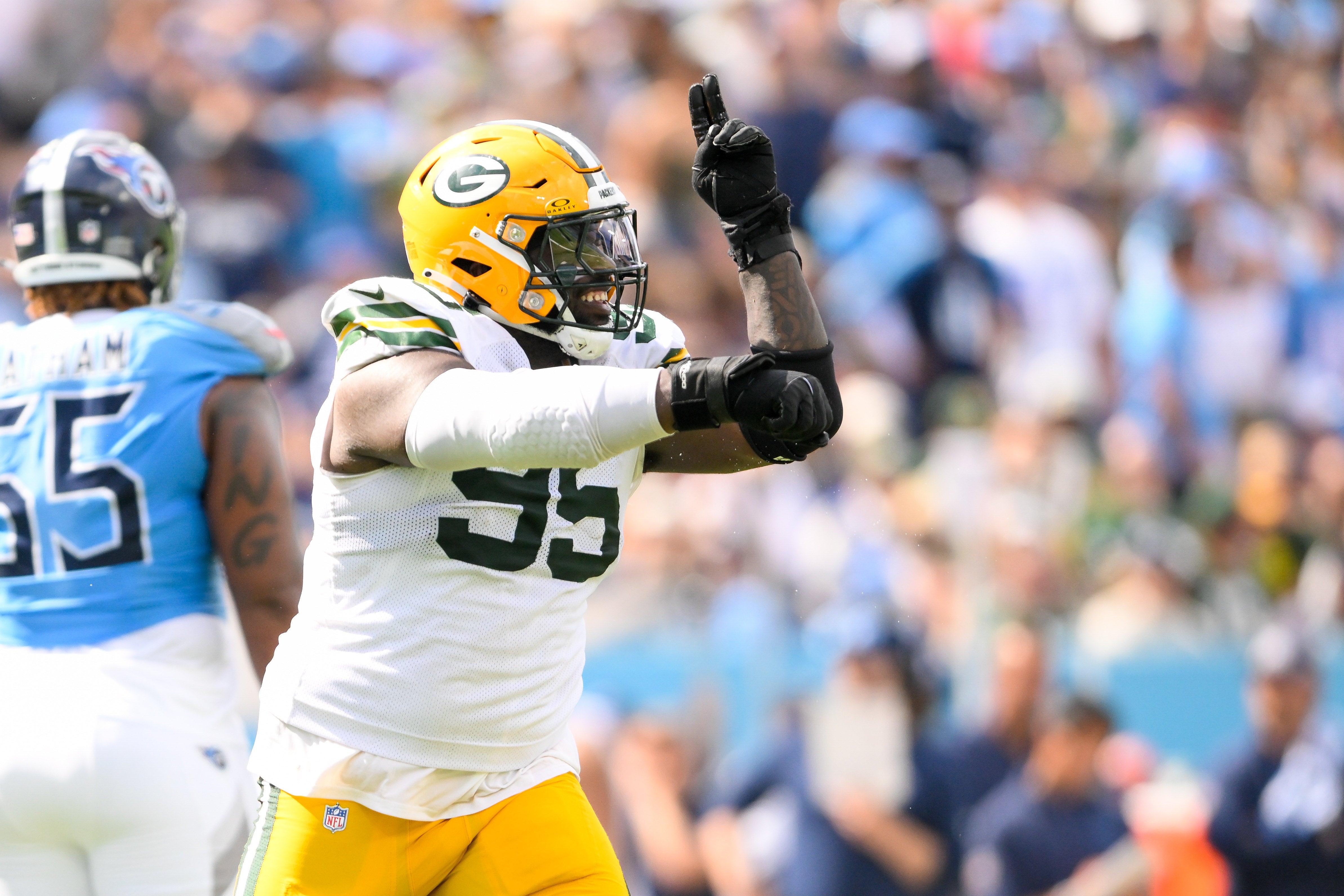Green Bay Packers defensive tackle Devonte Wyatt (95) celebrates his sack Tennessee Titans Will Levis (8) during the second half at Nissan Stadium.