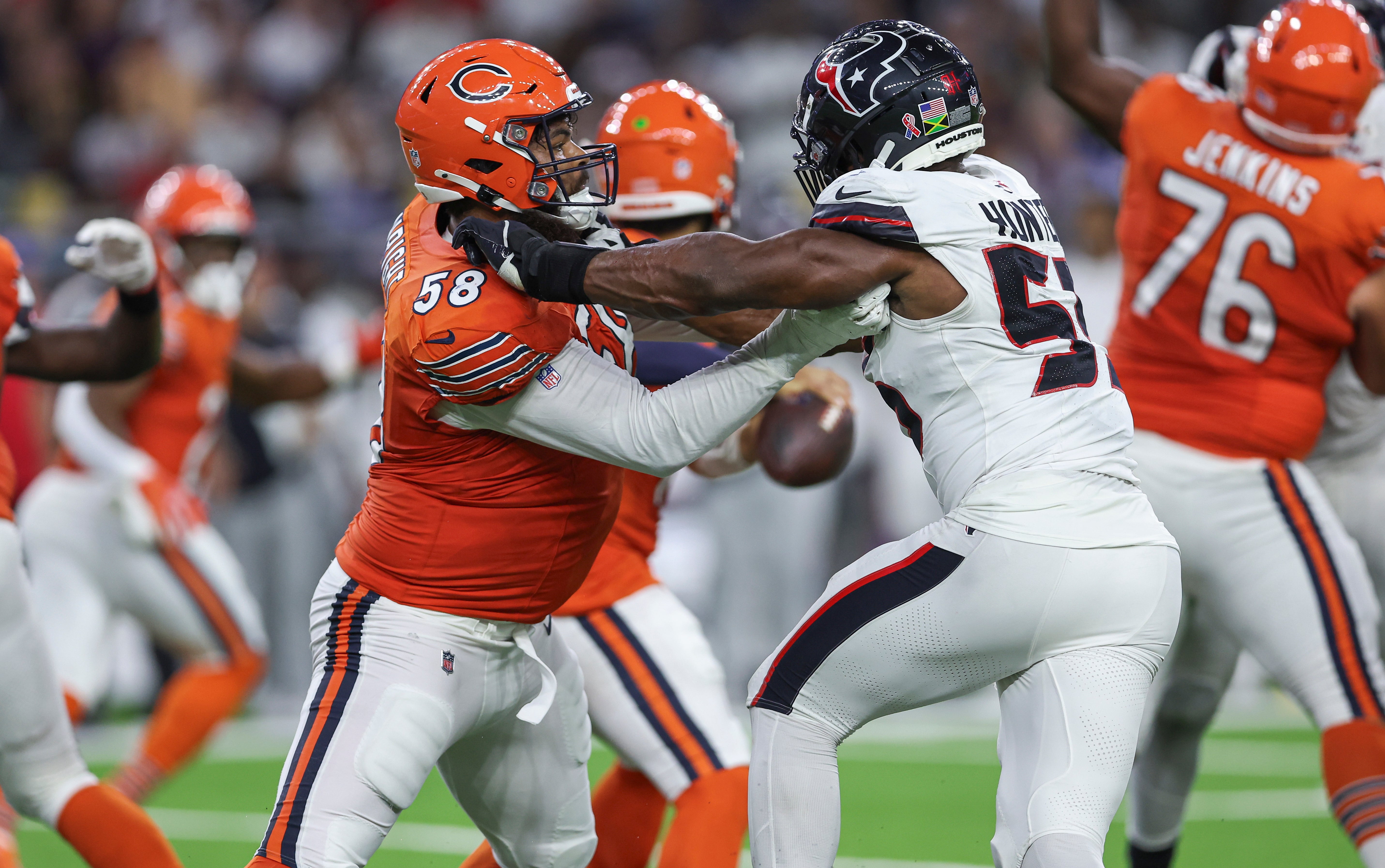 Sep 15, 2024; Houston, Texas, USA; Chicago Bears offensive tackle Darnell Wright (58) blocks against Houston Texans defensive end Danielle Hunter (55) during the game at NRG Stadium.