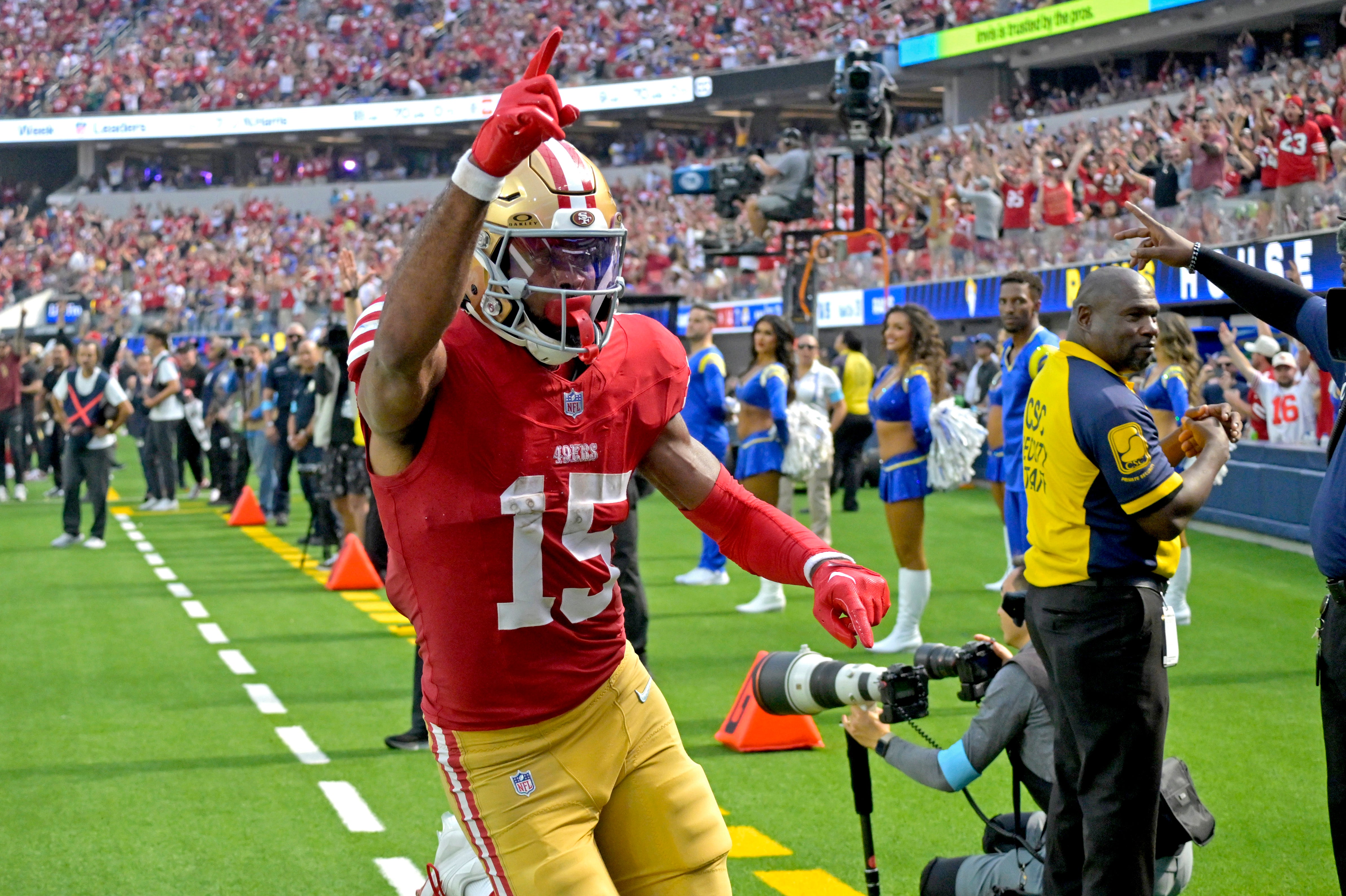 Inglewood, California, USA; San Francisco 49ers wide receiver Jauan Jennings (15) celebrates after a touchdown in the second half against the Los Angeles Rams at SoFi Stadium.