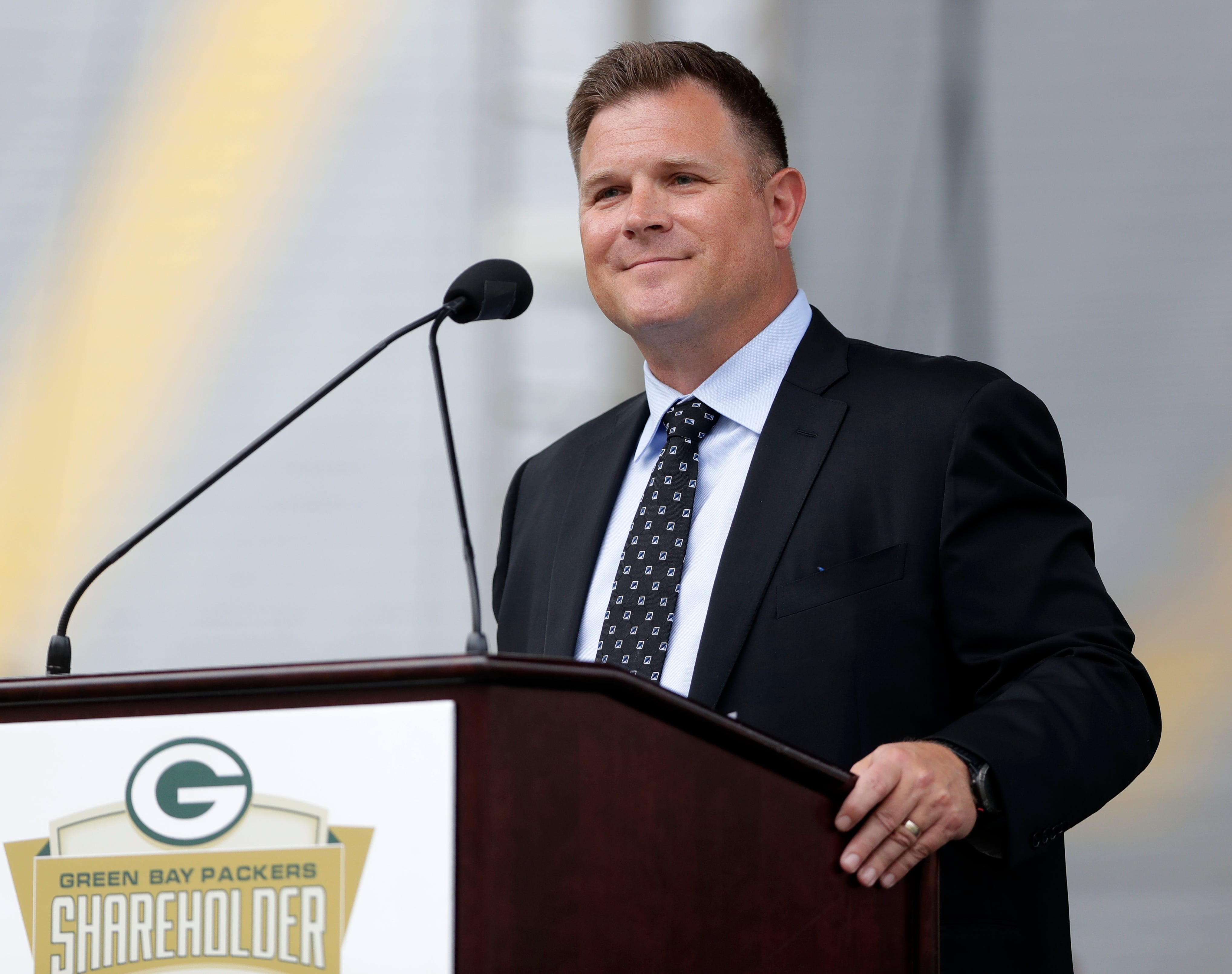 Green Bay Packers General Manager Brian Gutekunst addresses about 7,800 shareholders and guests during the annual meeting on July 24, 2023, in Green Bay, Wis.