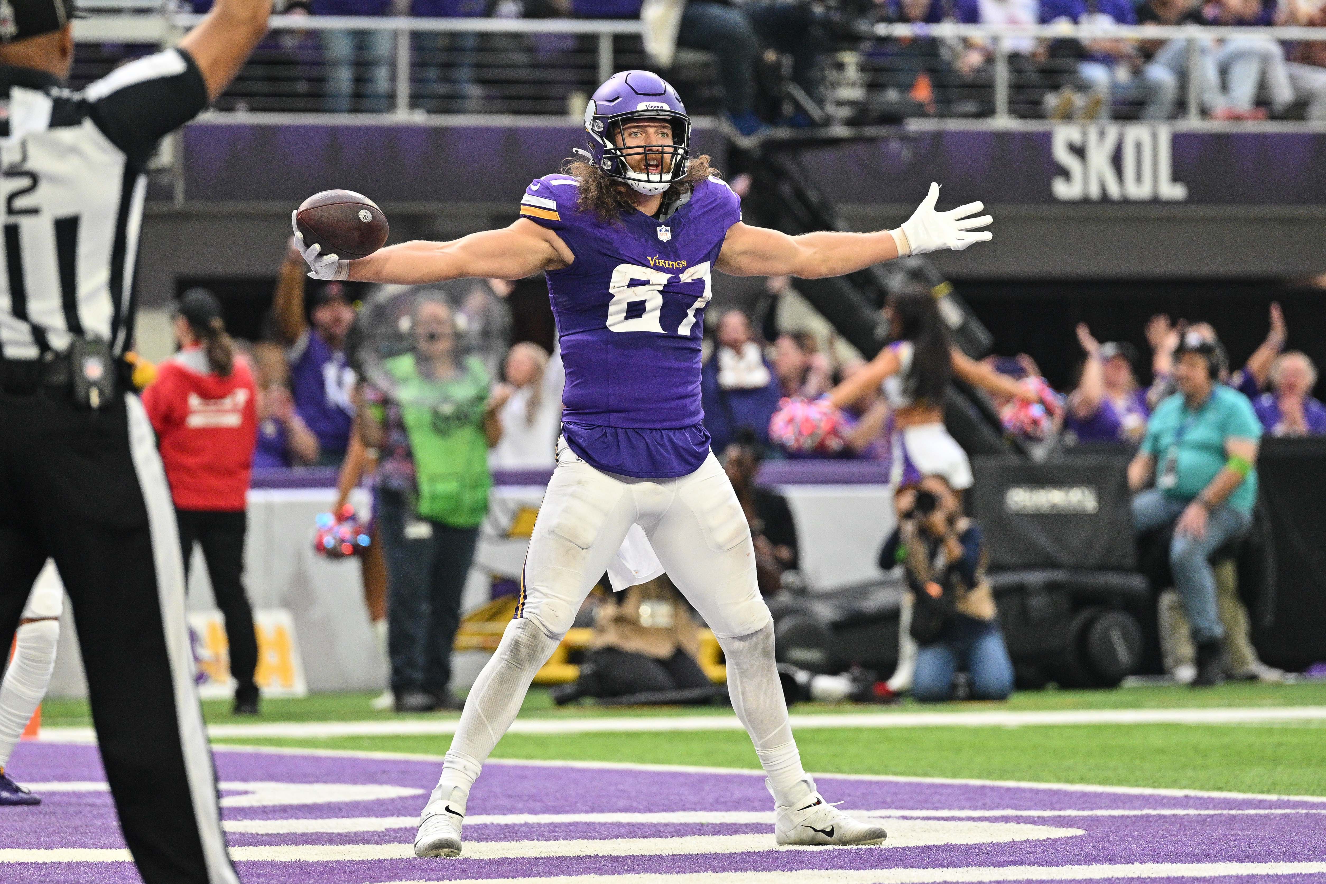 Nov 12, 2023; Minneapolis, Minnesota, USA; Minnesota Vikings tight end T.J. Hockenson (87) reacts after a touchdown against the New Orleans Saints at U.S. Bank Stadium.
