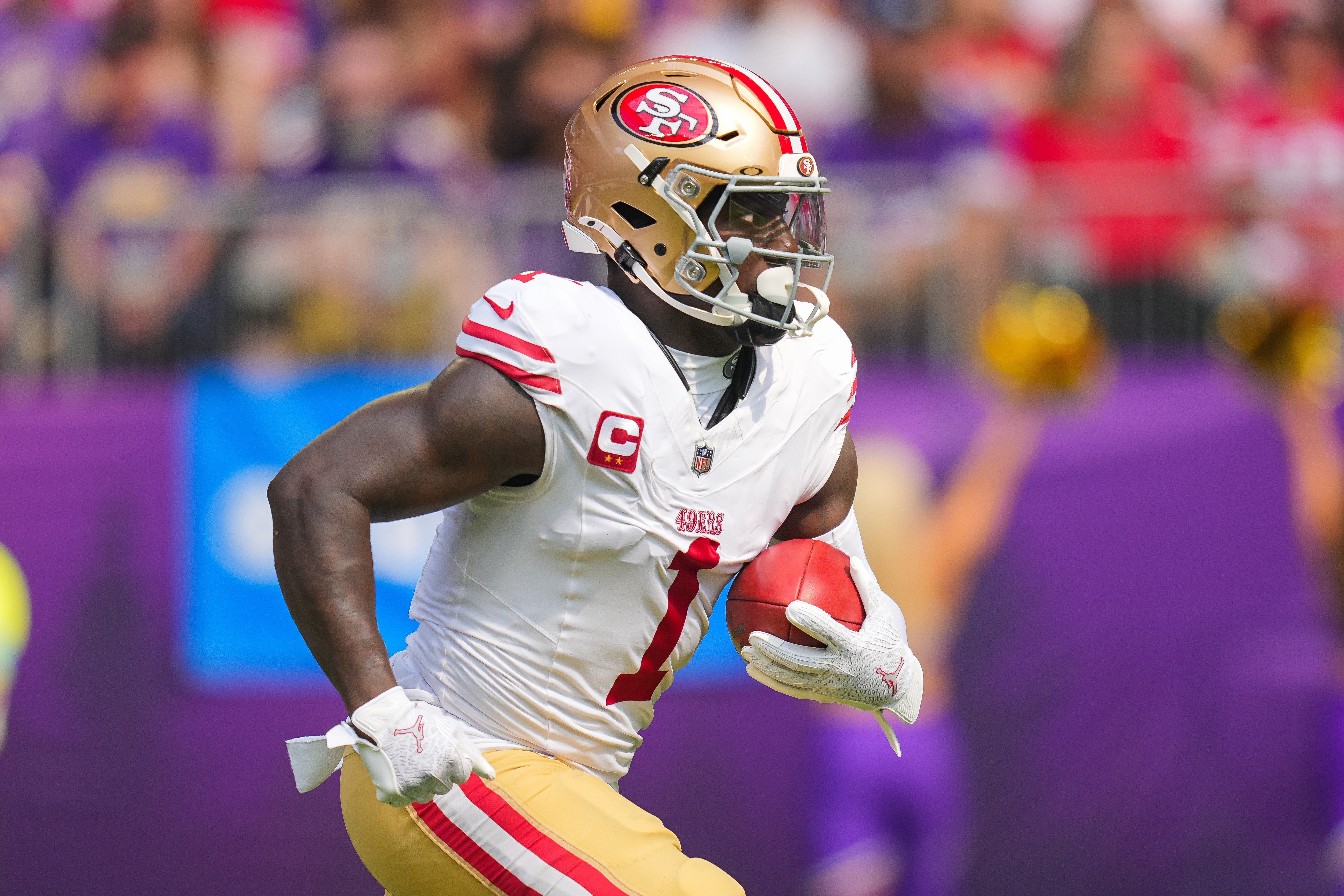 San Francisco 49ers wide receiver Deebo Samuel Sr. (1) runs back a kick against the Minnesota Vikings in the first quarter at U.S. Bank Stadium.