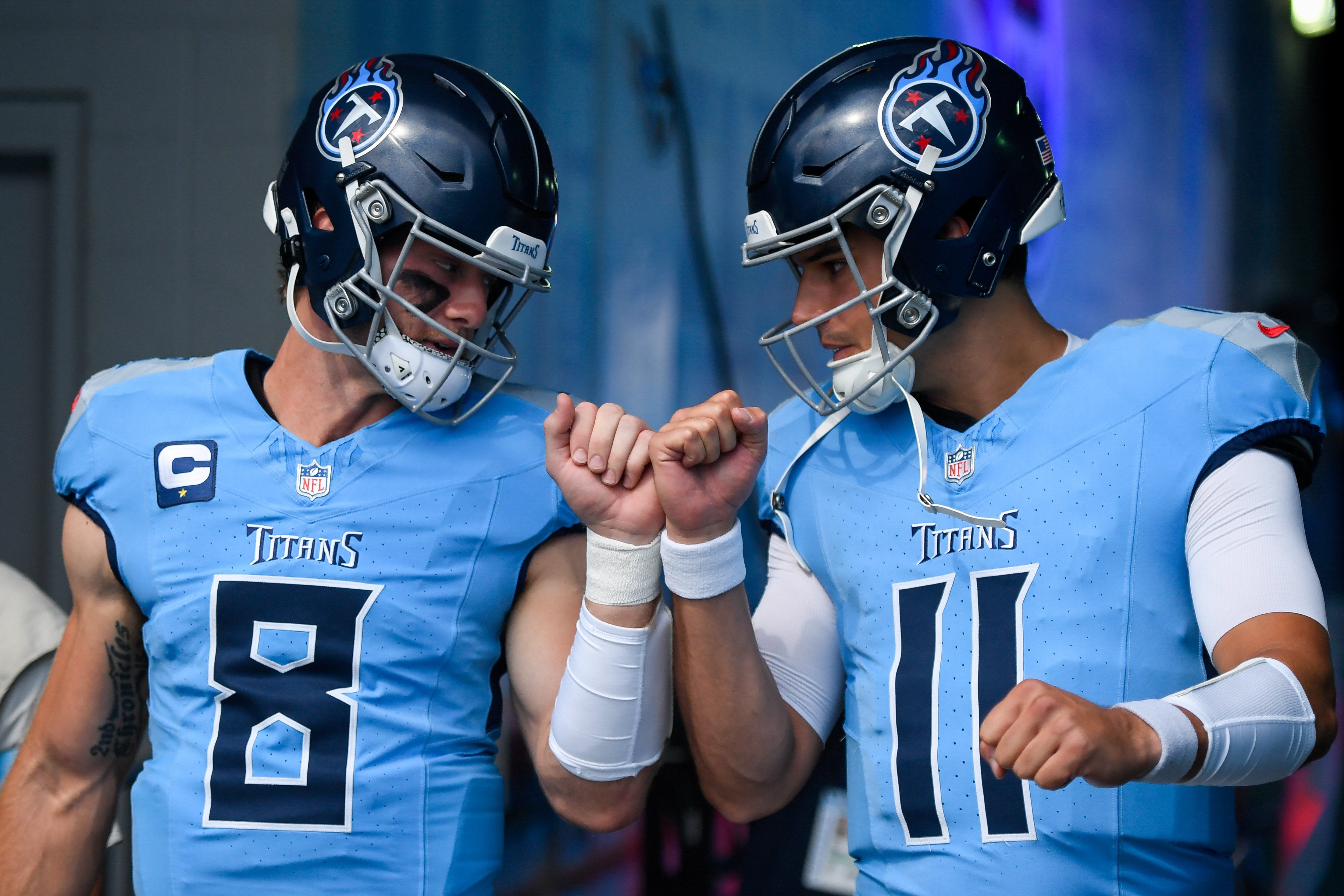 Sep 22, 2024; Nashville, Tennessee, USA; Tennessee Titans Will Levis (8) and quarterback Mason Rudolph (11) take the fieldagainst the Green Bay Packers during pregame warmups at Nissan Stadium. Mandatory Credit: Steve Roberts-Imagn Images