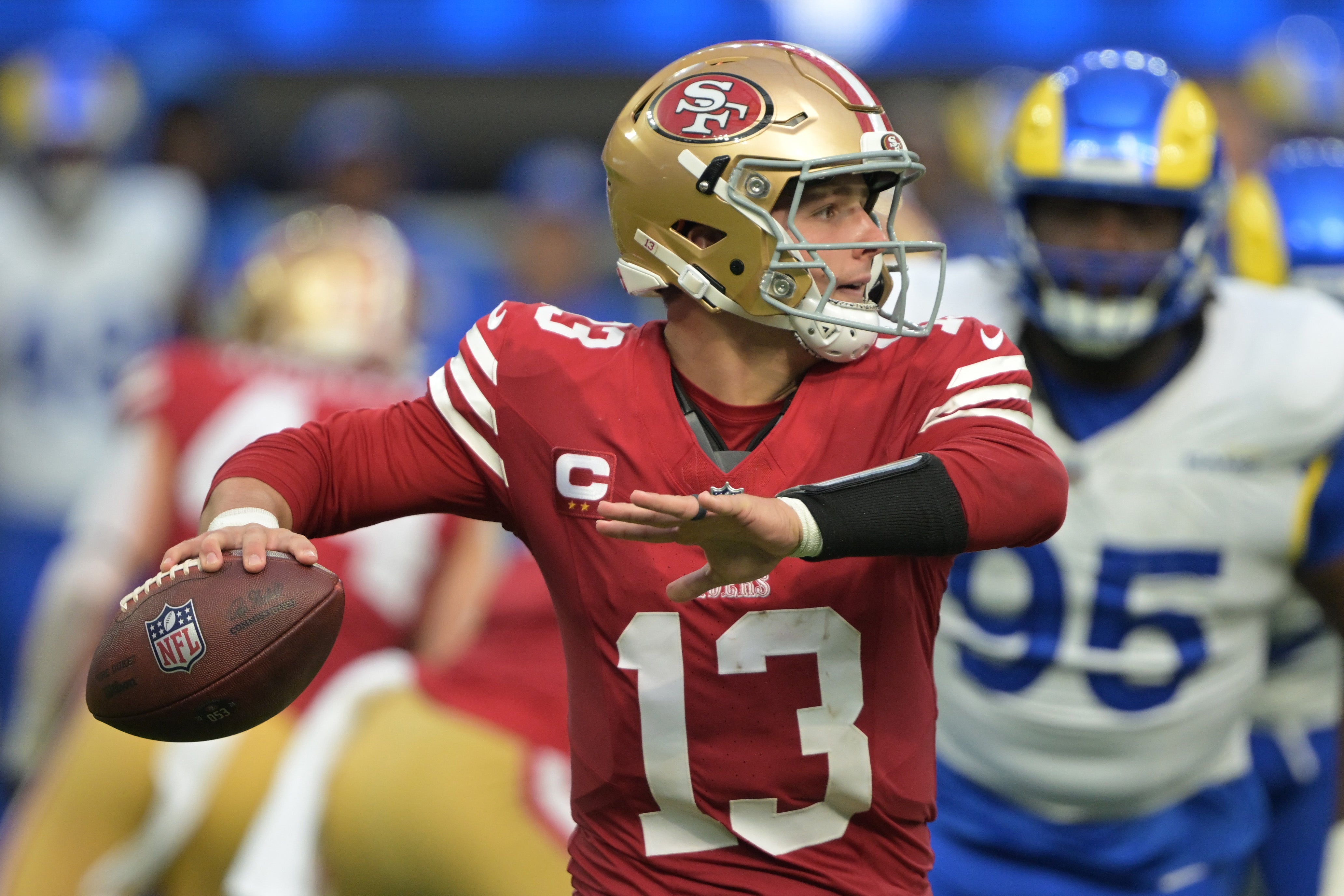 Sep 22, 2024; Inglewood, California, USA; San Francisco 49ers quarterback Brock Purdy (13) throws a pass in the second half against the Los Angeles Rams at SoFi Stadium.