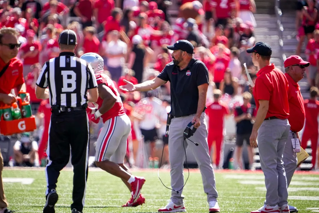 Ohio State Buckeyes head coach Ryan Day reacts to the referee after receiving an unsportsmanlike conduct penalty in the second half at Ohio Stadium on Saturday