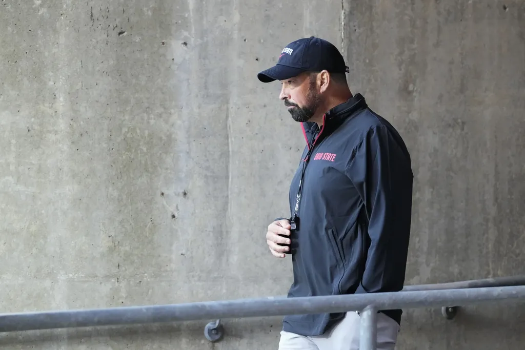 Ohio State Buckeyes head coach Ryan Day takes the field before a game against the Western Michigan Broncos at Ohio Stadium.