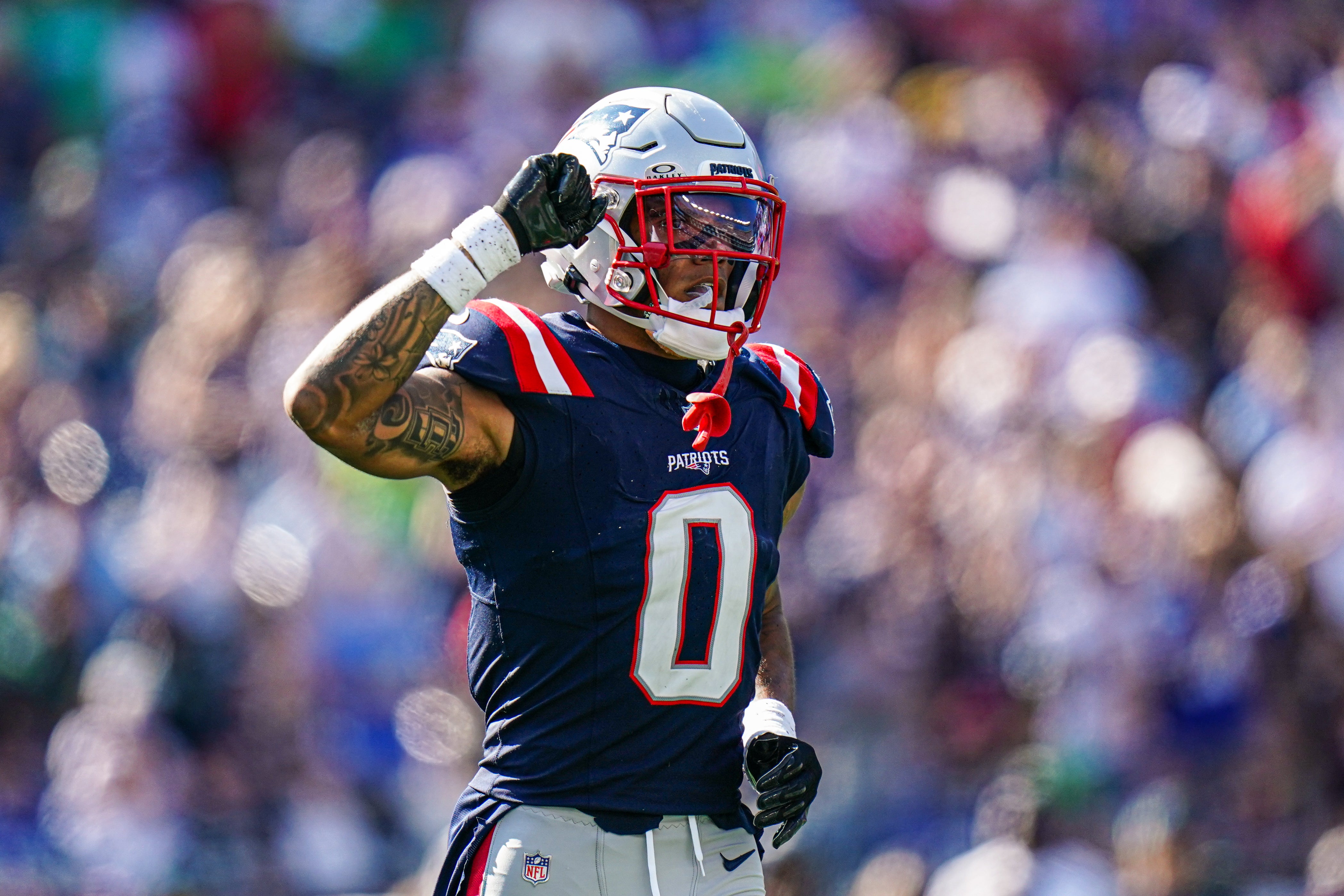 Sep 15, 2024; Foxborough, Massachusetts, USA; New England Patriots cornerback Christian Gonzalez (0) reacts after a play against the Seattle Seahawks in the second half at Gillette Stadium.