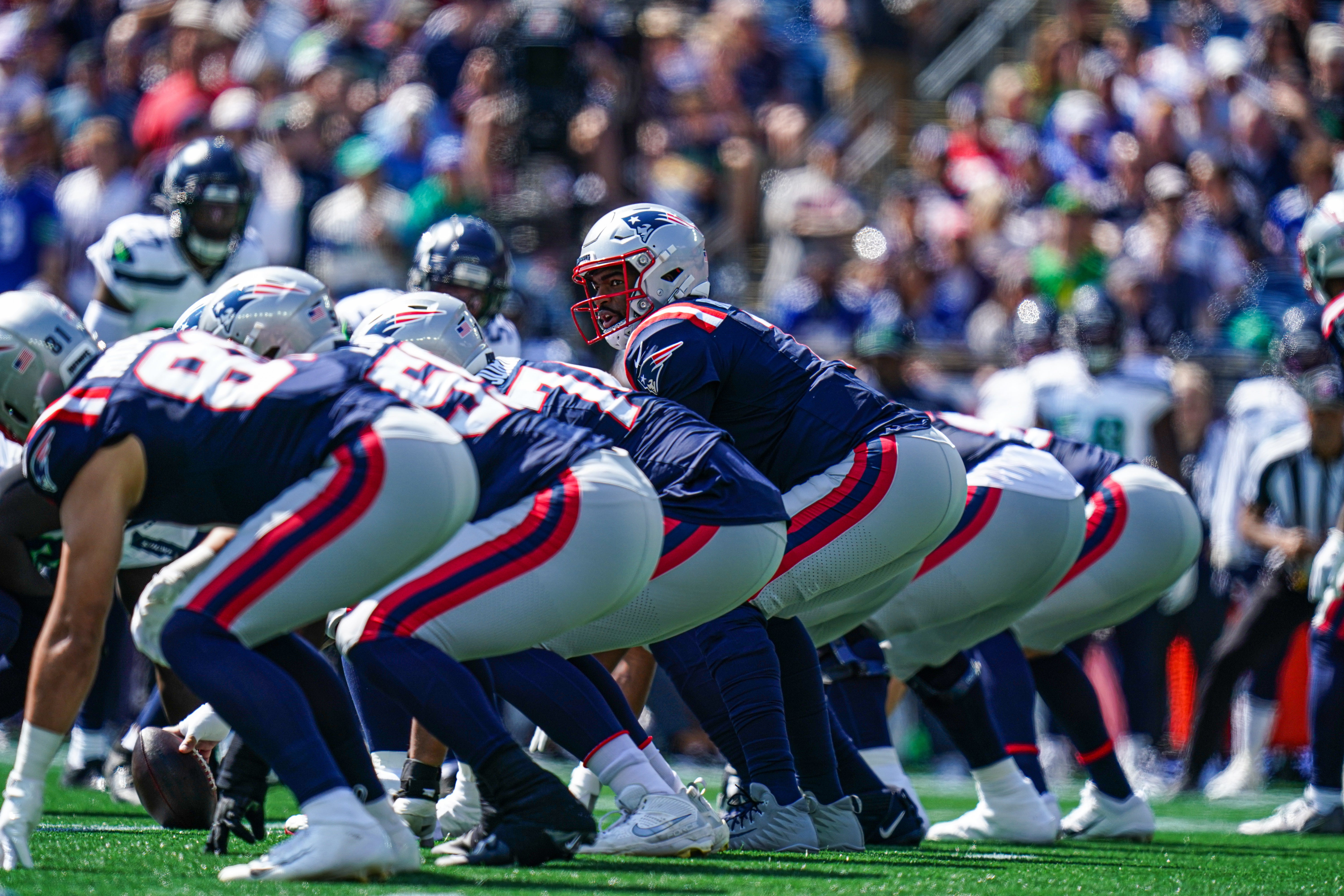Sep 15, 2024; Foxborough, Massachusetts, USA; New England Patriots quarterback Jacoby Brissett (7) at the line against the Seattle Seahawks in the first quarter at Gillette Stadium.