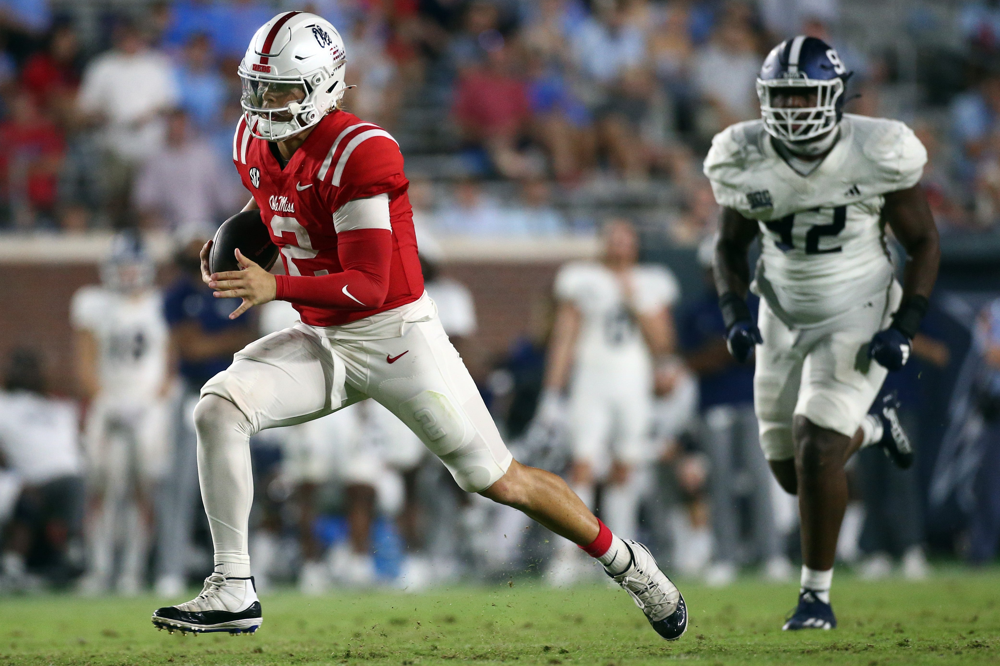 Sep 21, 2024; Oxford, Mississippi, USA; Mississippi Rebels quarterback Jaxson Dart (2) runs the ball for a first down during the second half against the Georgia Southern Eagles at Vaught-Hemingway Stadium.