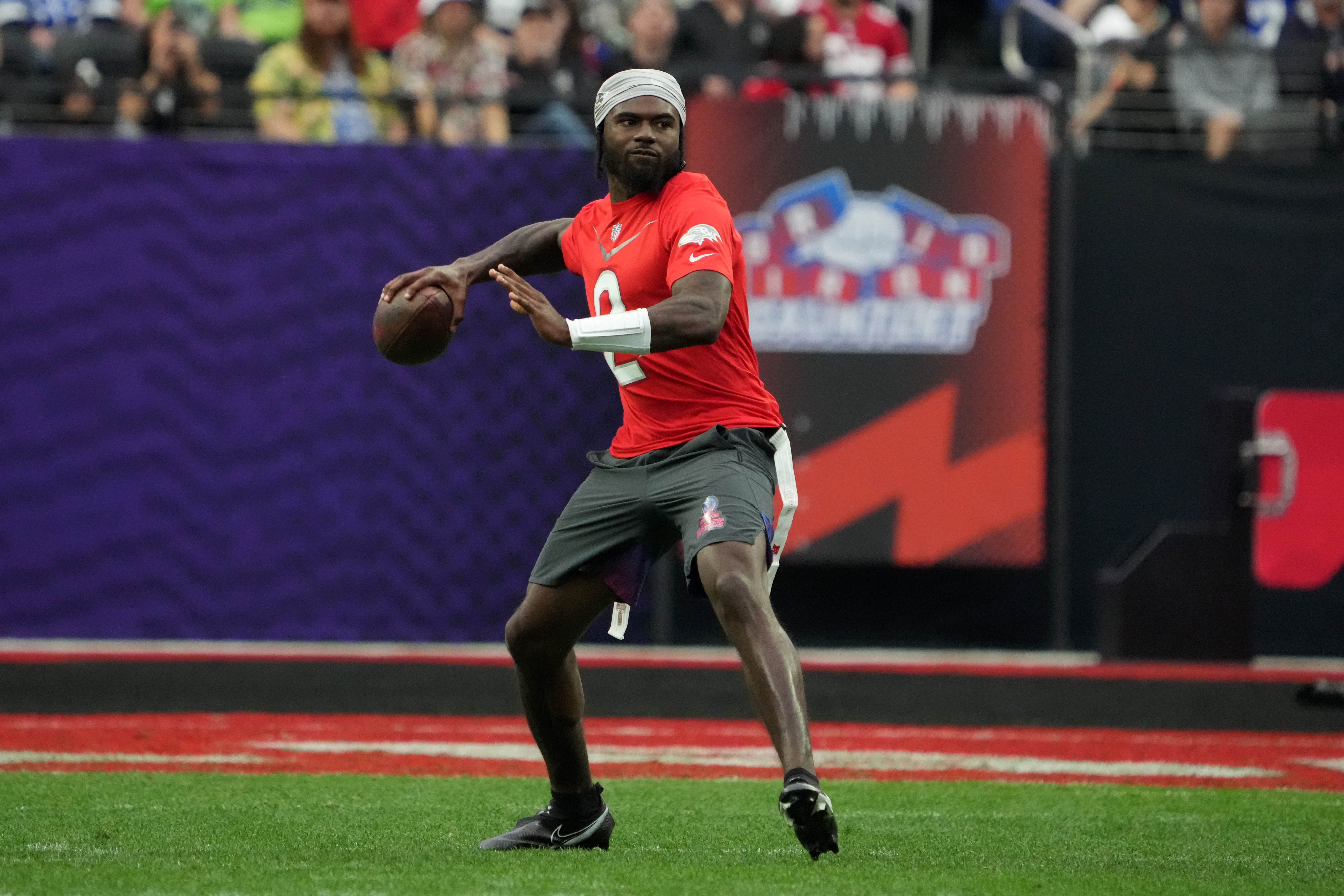 Feb 5, 2023; Paradise, Nevada, USA; AFC quarterback Tyler Huntley of the Baltimore Ravens (2) throws the ball against the NFC during the Pro Bowl Games at Allegiant Stadium. Mandatory Credit: Kirby Lee-Imagn Images