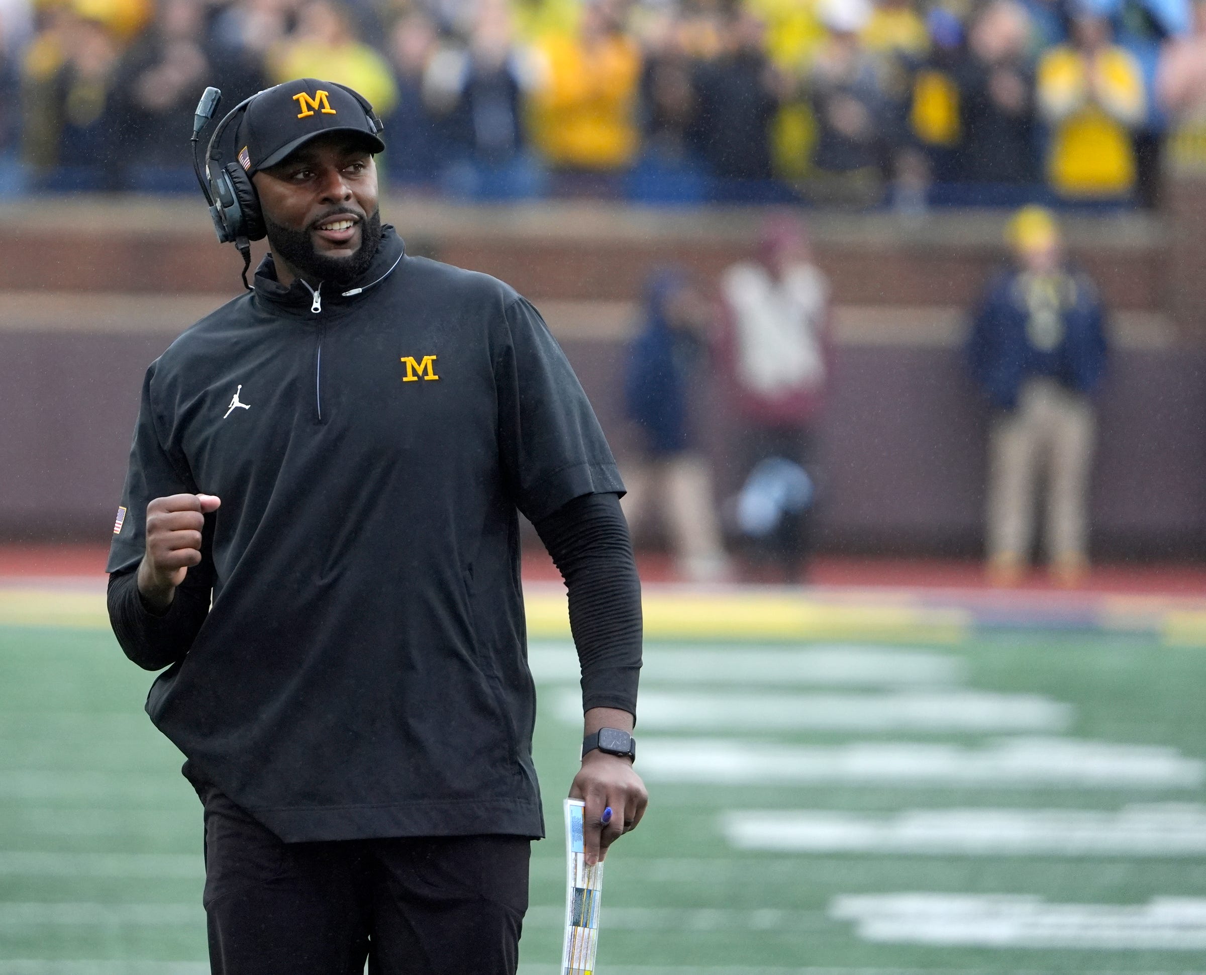 Michigan football coach Sherrone Moore celebrates a play during first-half action between Michigan and Minnesota at Michigan Stadium in Ann Arbor on Saturday, Sept. 28, 2024.
