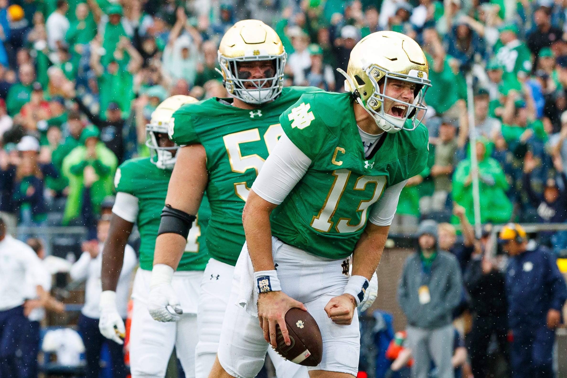 Notre Dame quarterback Riley Leonard celebrates touchdown run against Lousville
