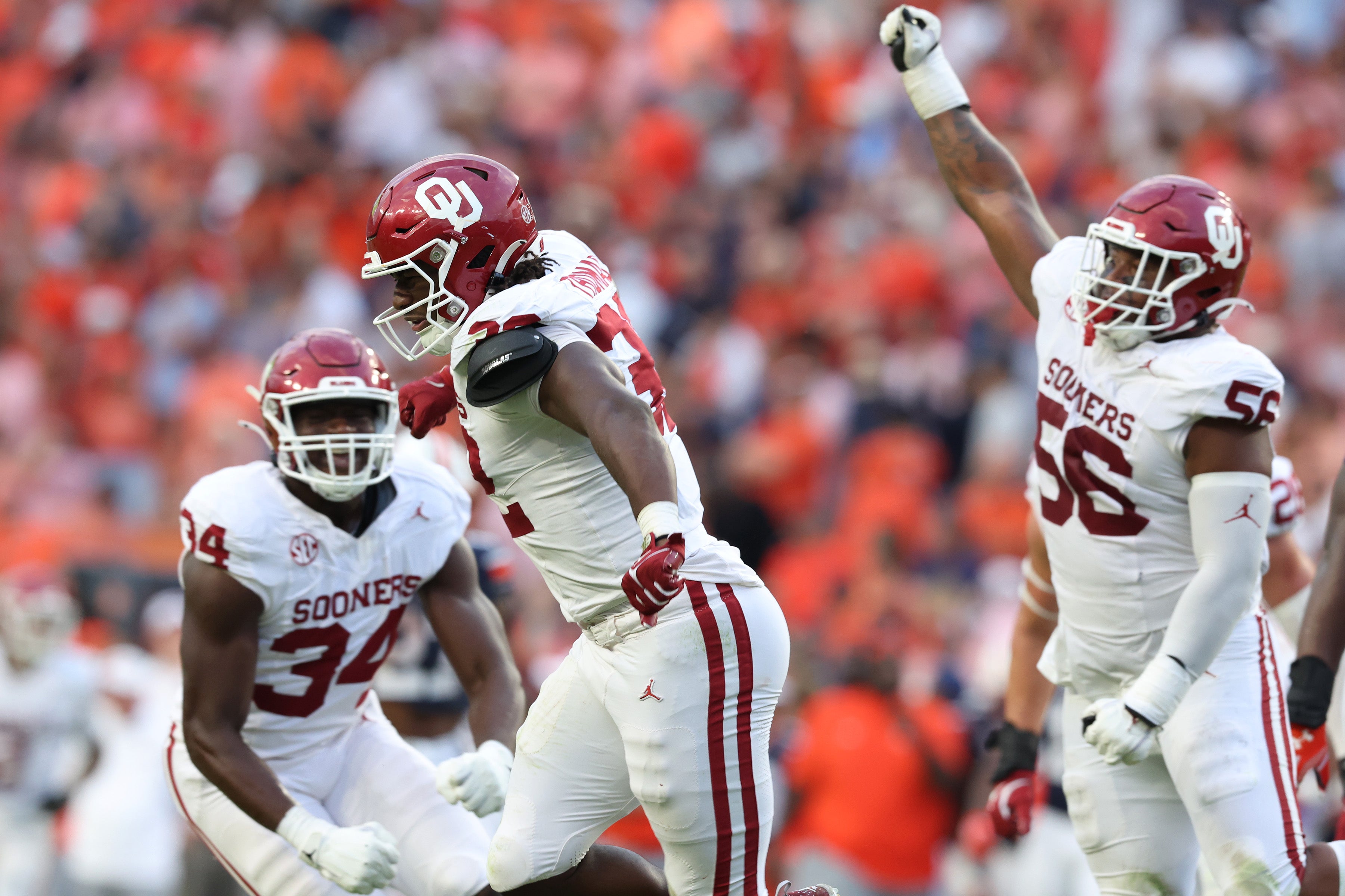 Sep 28, 2024; Auburn, Alabama, USA; Oklahoma Sooners defensive lineman R Mason Thomas (32) celebrates after sacking Auburn Tigers quarterback Payton Thorne (1) during the fourth quarter at Jordan-Hare Stadium. 