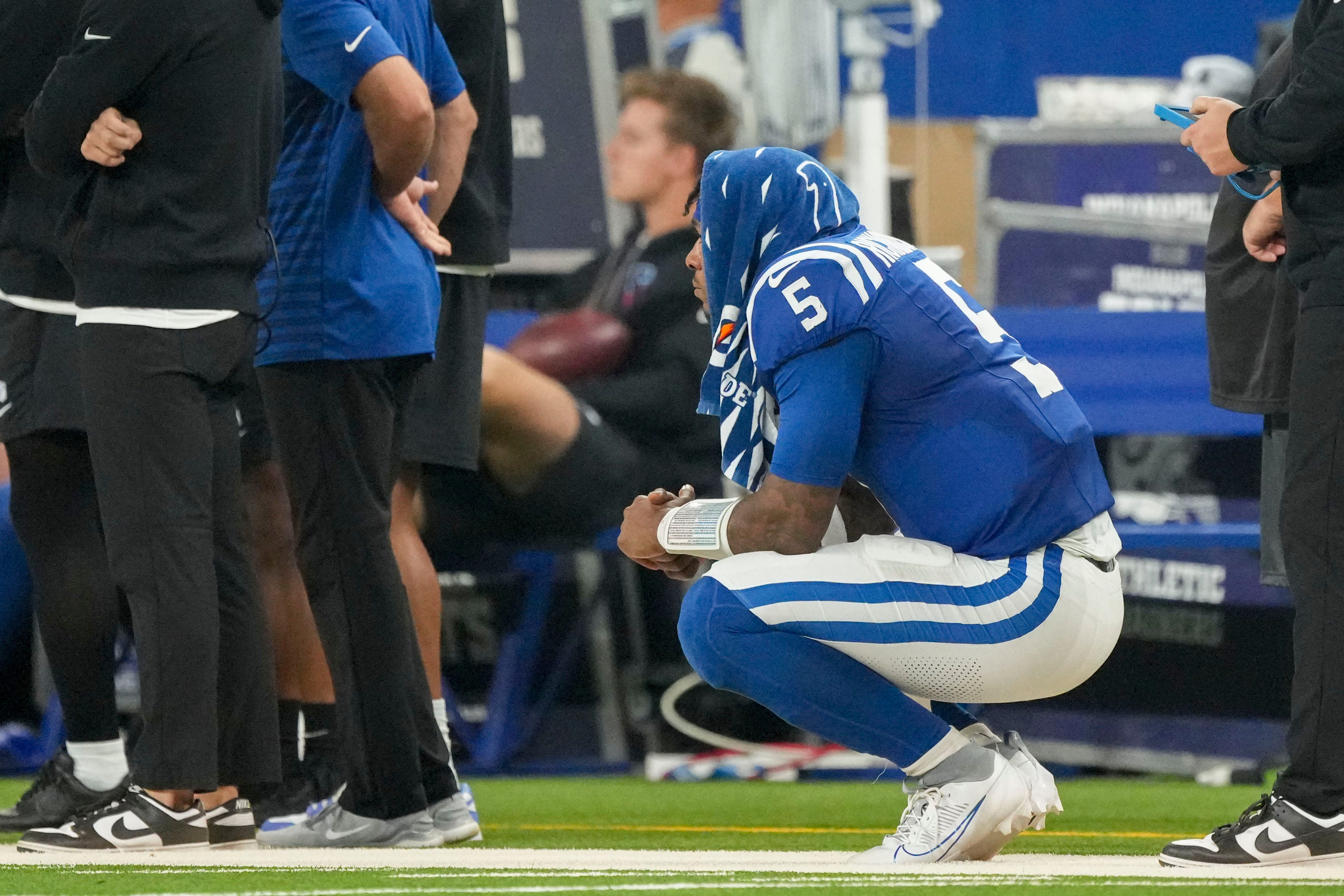Indianapolis Colts quarterback Anthony Richardson (5) watches the action on the field from the sideline Sunday, Sept. 29, 2024, during a game against the Pittsburgh Steelers at Lucas Oil Stadium in Indianapolis.