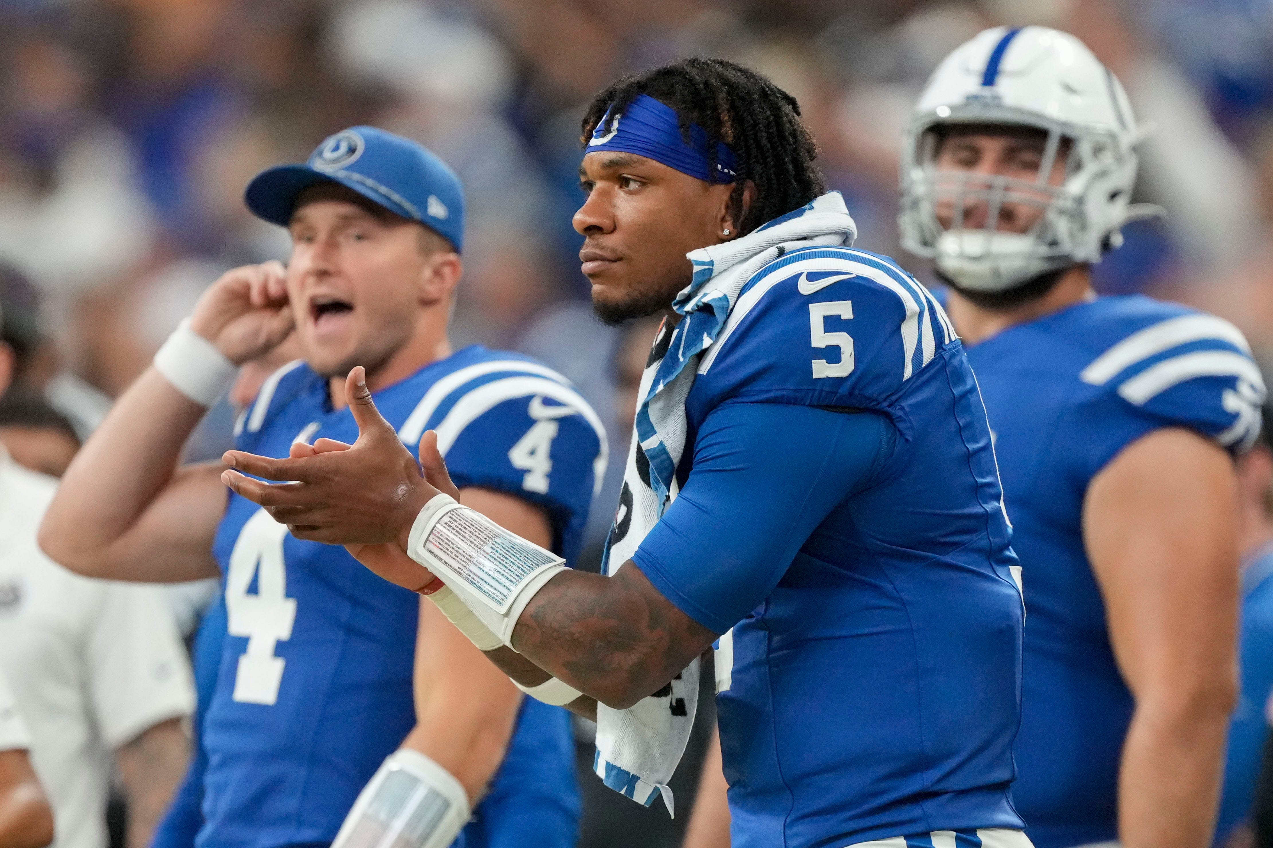 Indianapolis Colts quarterback Anthony Richardson (5) watches the action on the field from the sideline Sunday, Sept. 29, 2024, during a game against the Pittsburgh Steelers at Lucas Oil Stadium in Indianapolis.
