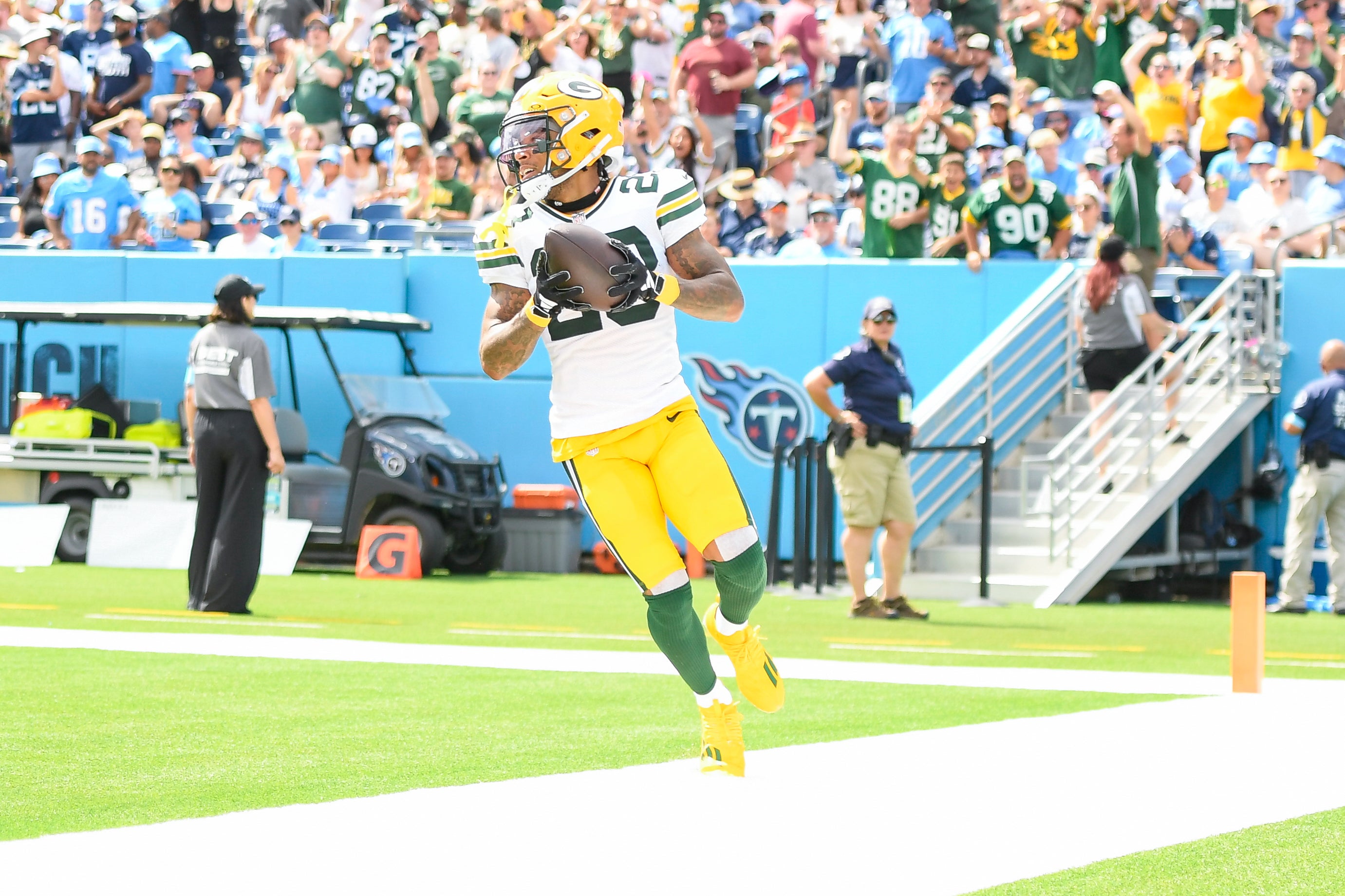 Green Bay Packers cornerback Jaire Alexander (23) scores on a pick six thrown by Tennessee Titans Will Levis (8) during the first half at Nissan Stadium.