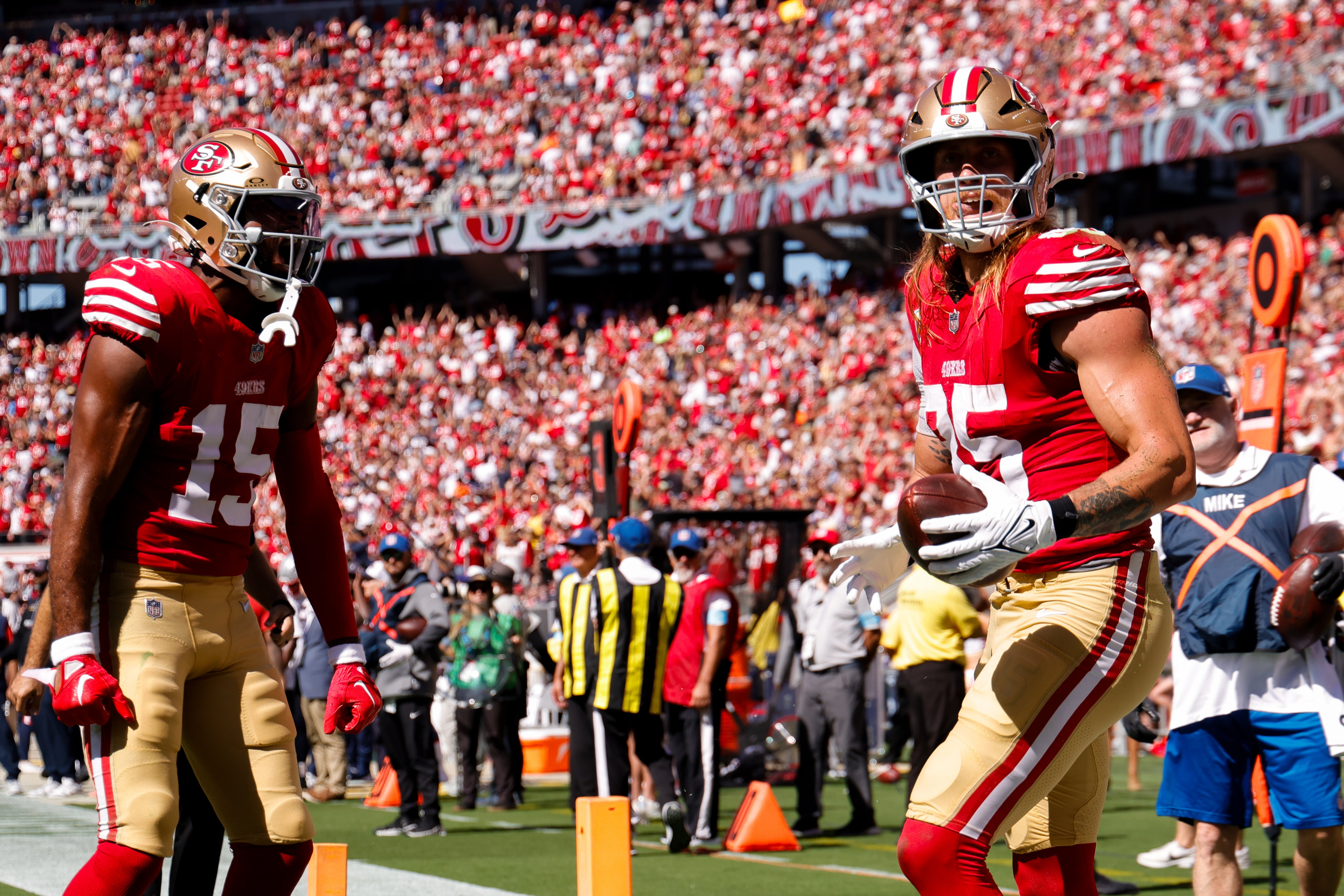 San Francisco 49ers tight end George Kittle (85) celebrates with wide receiver Jauan Jennings (15) after a touchdown against the New England Patriots during the second quarter at Levi's Stadium.