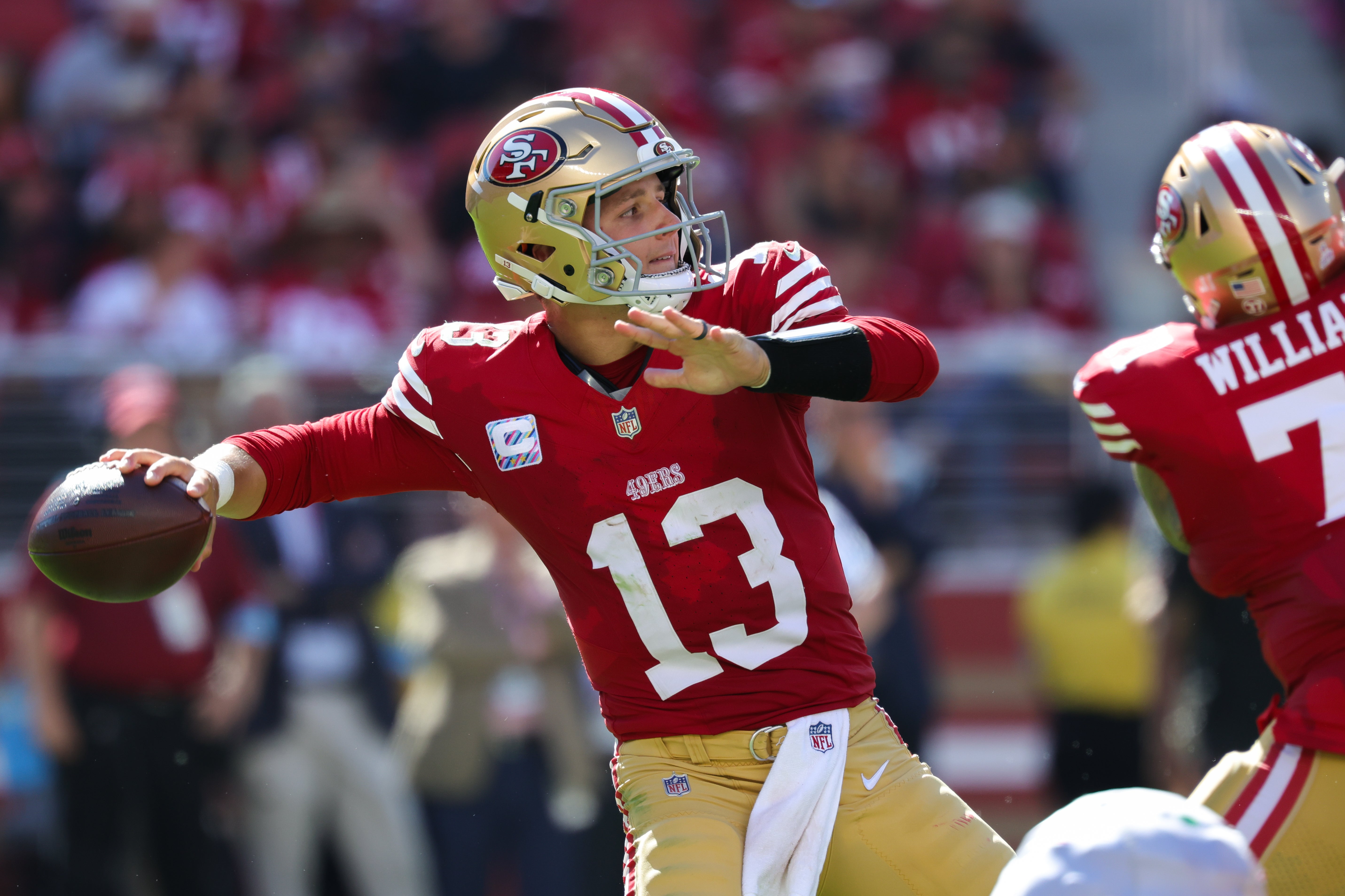 San Francisco 49ers quarterback Brock Purdy (13) throws a pass against the New England Patriots during the third quarter at Levi's Stadium.