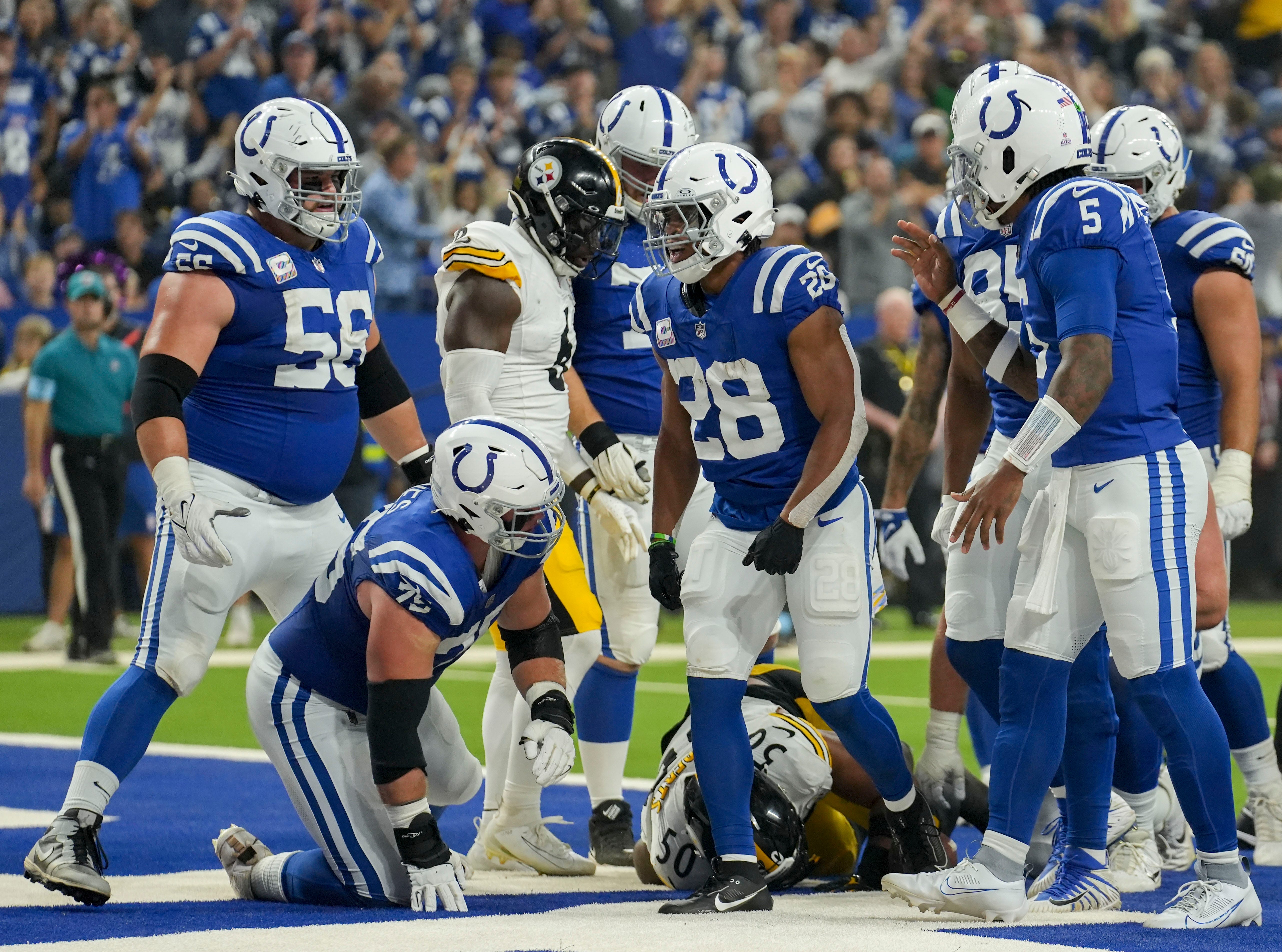 Indianapolis Colts running back Jonathan Taylor (28) celebrates after scoring a touchdown Sunday, Sept. 29, 2024, during a game against the Pittsburgh Steelers at Lucas Oil Stadium in Indianapolis.