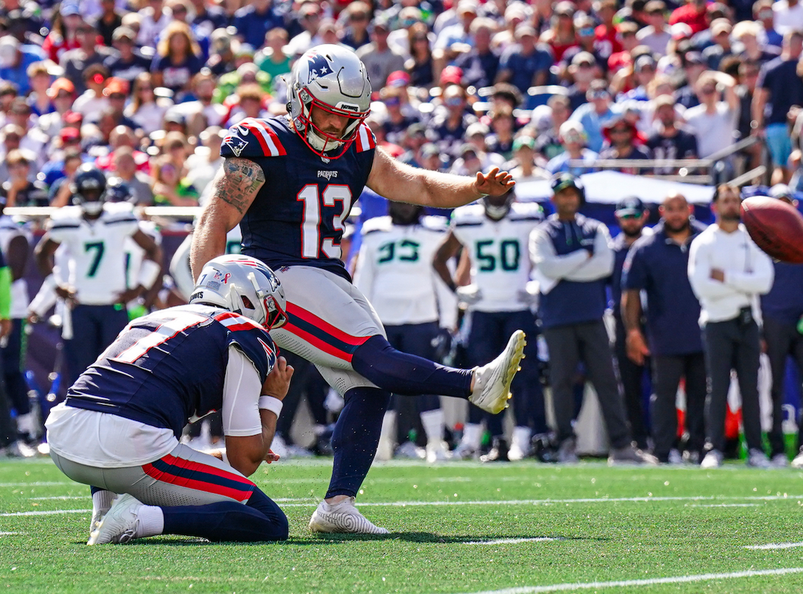 Sep 15, 2024; Foxborough, Massachusetts, USA; New England Patriots place kicker Joey Slye (13) kicks the extra point against the Seattle Seahawks in the second quarter at Gillette Stadium
