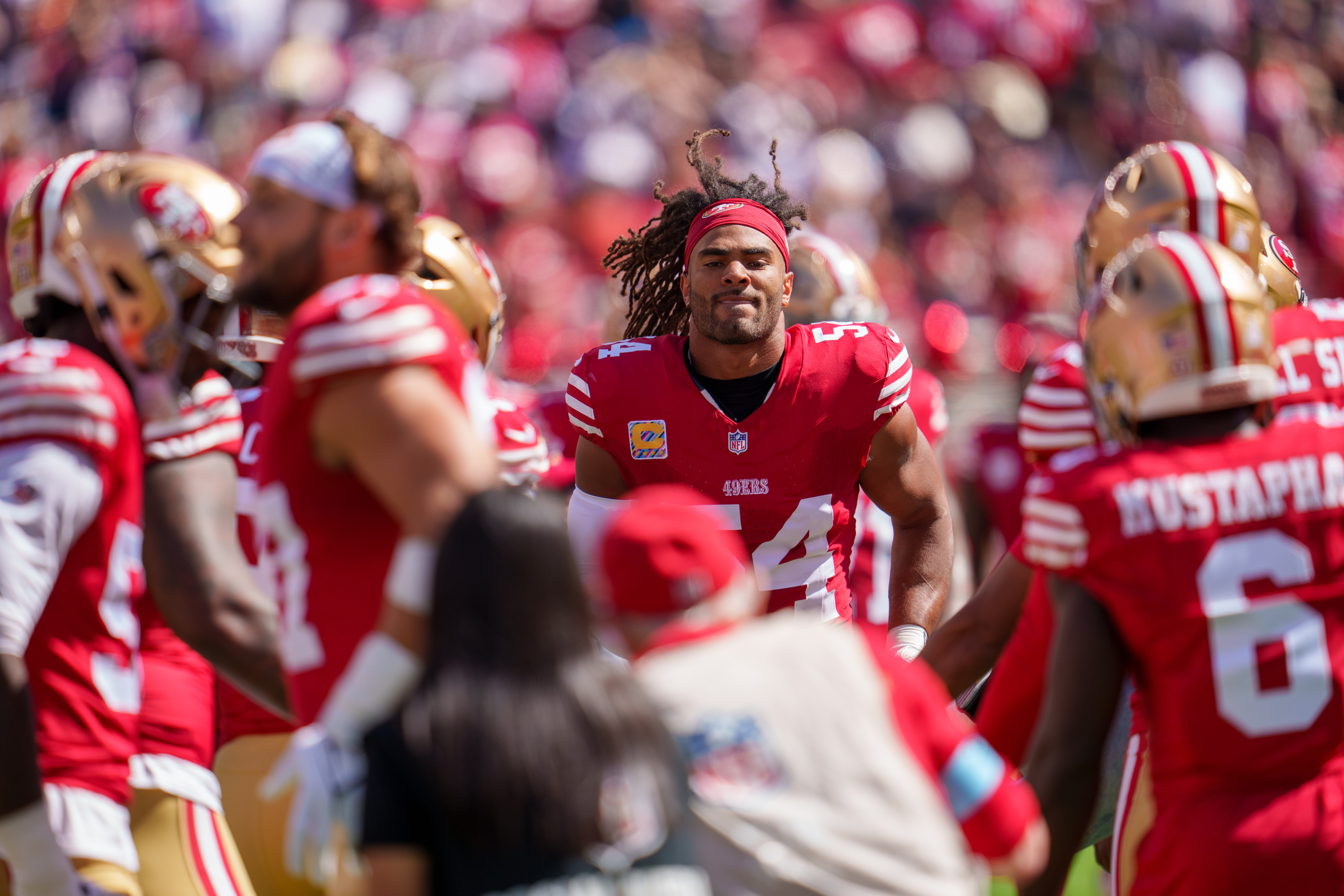 San Francisco 49ers linebacker Fred Warner (54) is introduced before the start of the game against the New England Patriots at Levi's Stadium.