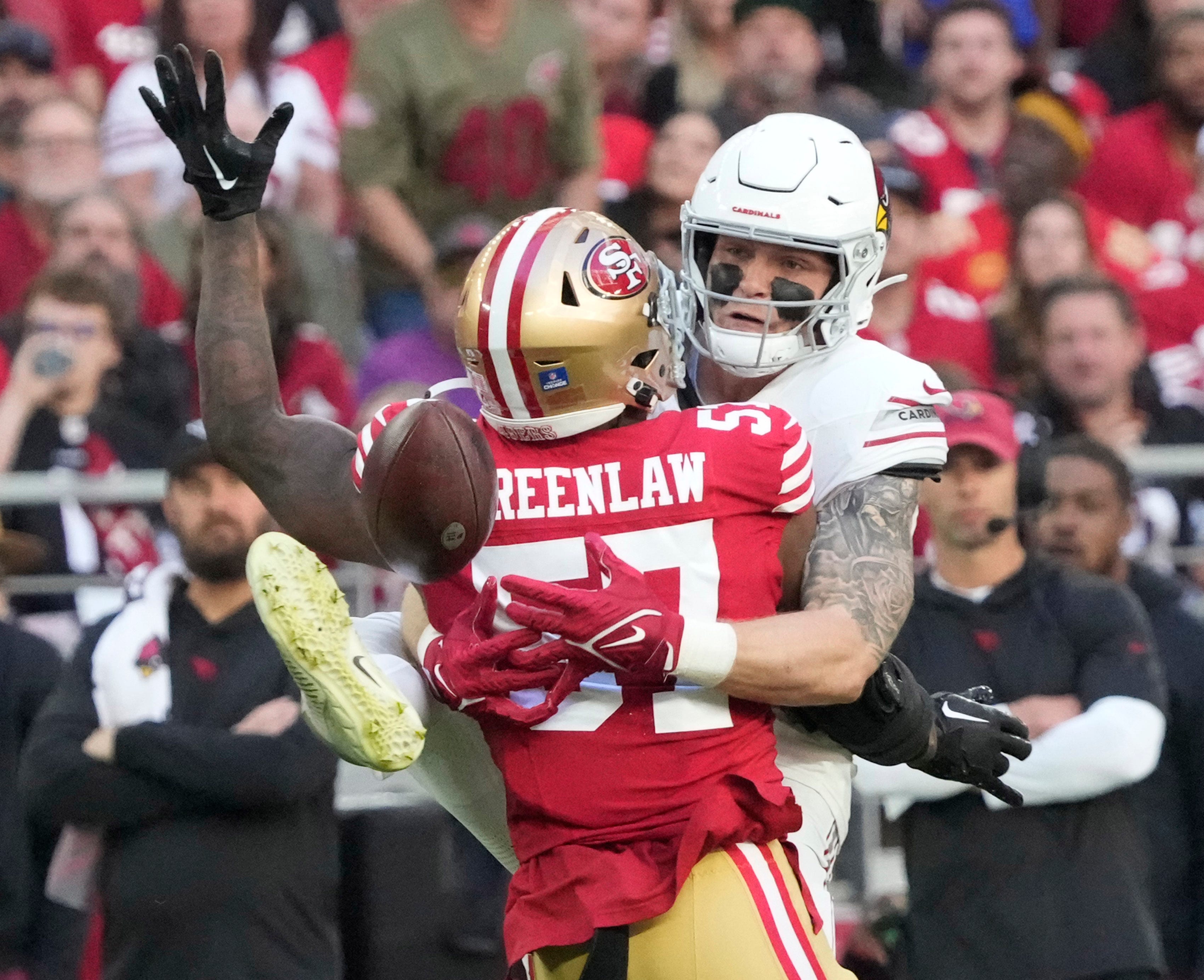 Cardinals tight end Trey McBride matches up against 49ers linebacker Dre Greenlaw.