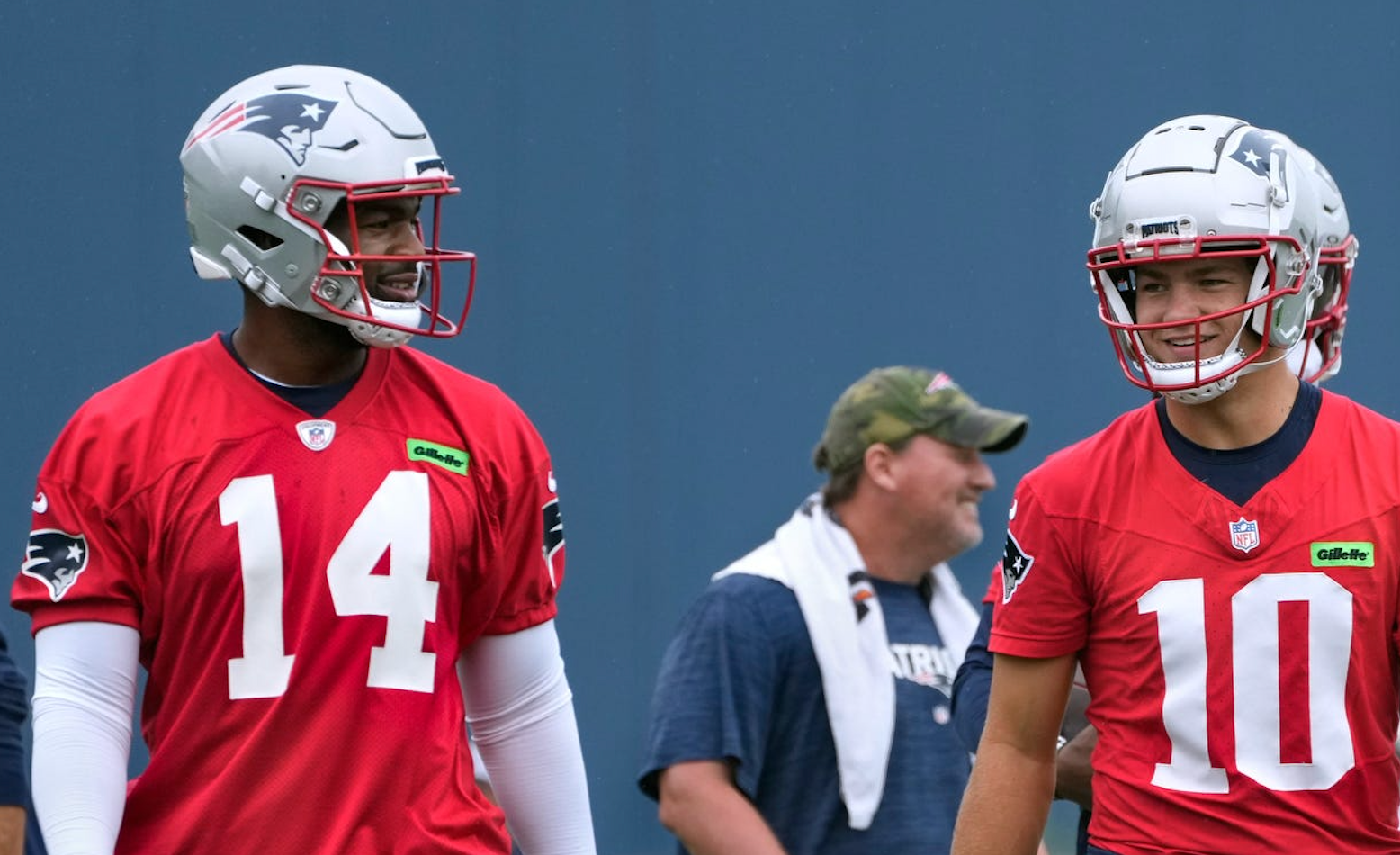 New England Patriots quarterbacks Jacoby Brissett and Drake Maye during first day of training camp Wednesday morning.  Created: