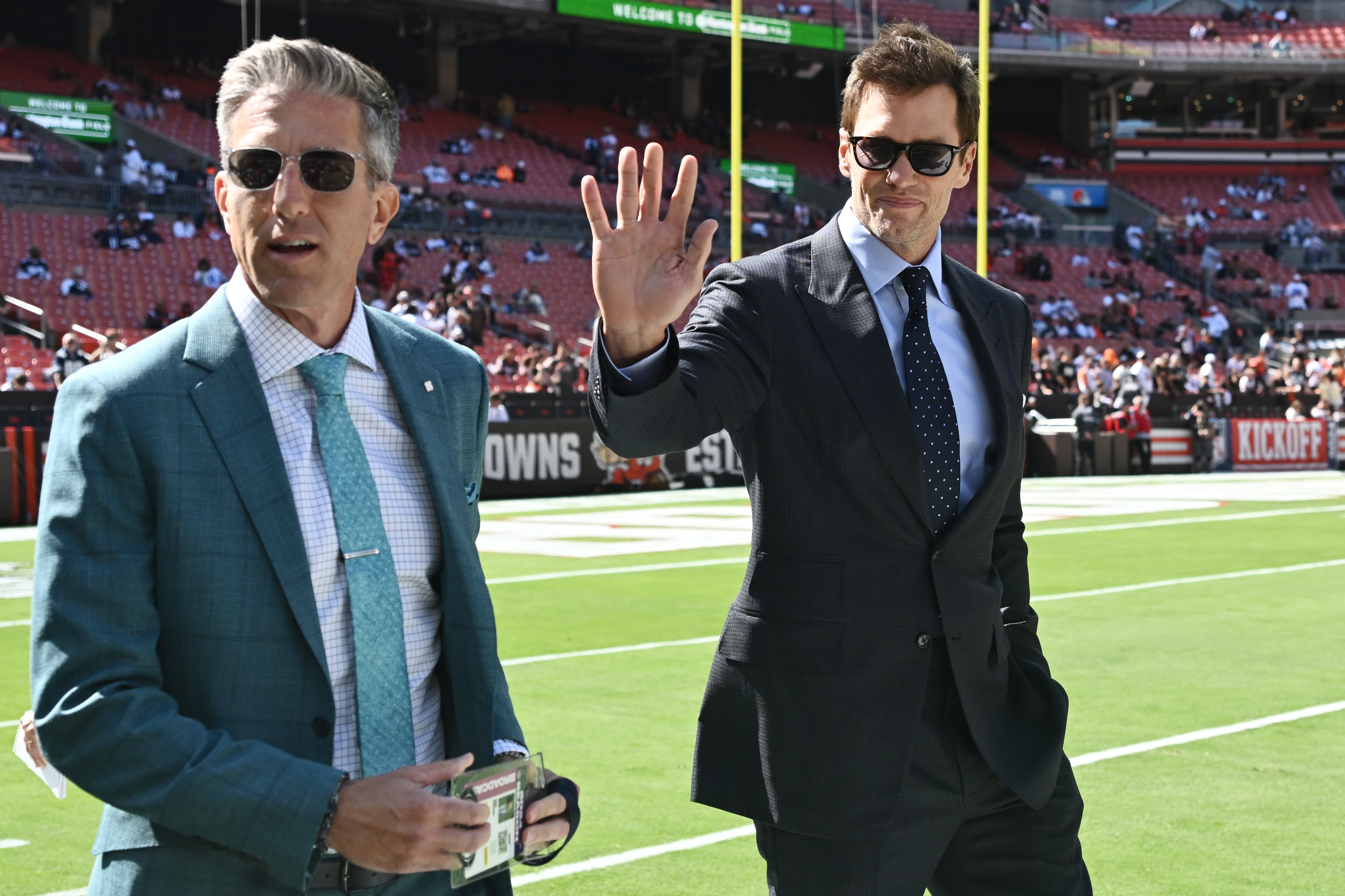 Fox Sports broadcaster Tom Brady greets fans before the game between the Cleveland Browns and the Dallas Cowboys at Huntington Bank Field.